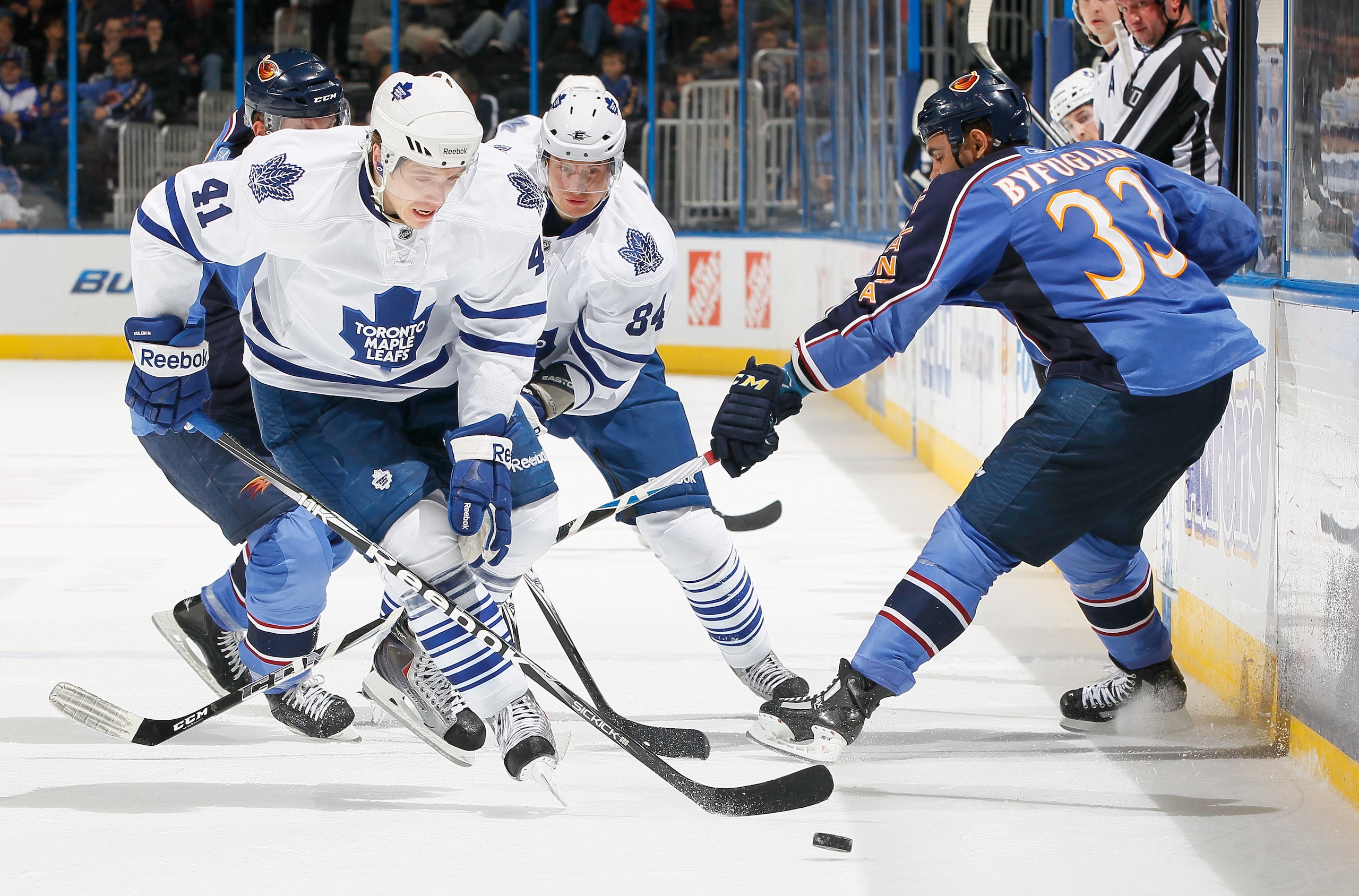 ATLANTA, GA - FEBRUARY 27:  Nikolai Kulemin #41 of the Toronto Maple Leafs steals the puck from Dustin Byfuglien #33 of the Atlanta Thrashers at Philips Arena on February 27, 2011 in Atlanta, Georgia.  (Photo by Kevin C. Cox/Getty Images)