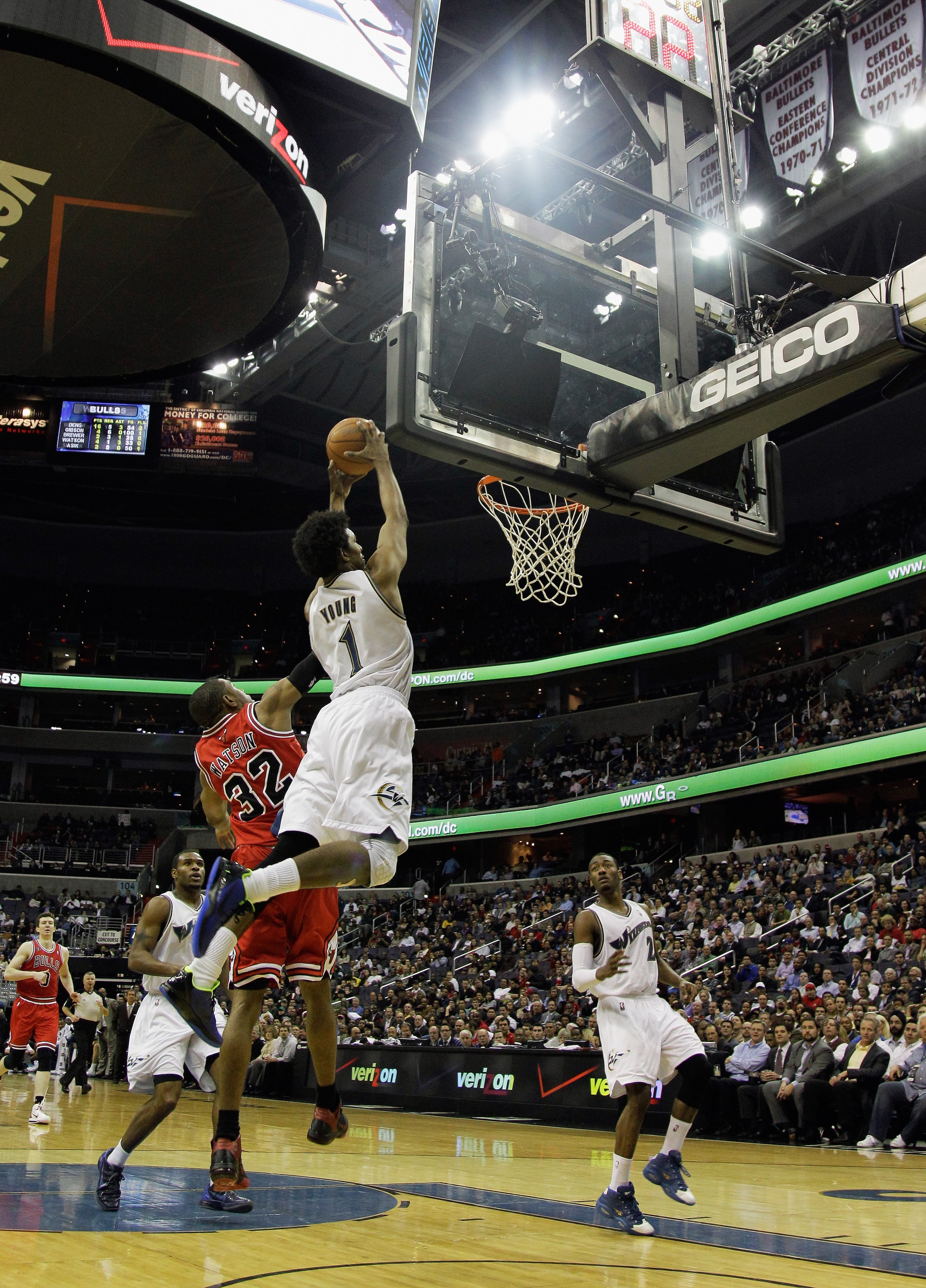 WASHINGTON, DC - FEBRUARY 28: Nick Young #1 of the Washington Wizards and C.J. Watson #32 of the Chicago Bulls at the Verizon Center in Washington on February 28, 2011 in Washington, DC. NOTE TO USER: User expressly acknowledges and agrees that, by downlo
