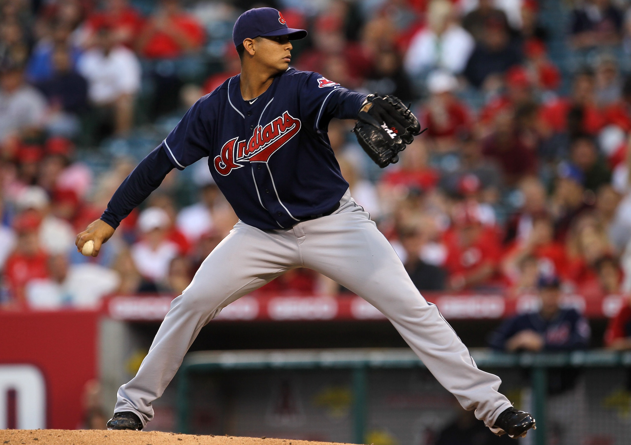 ANAHEIM, CA - SEPTEMBER 06:  Carlos Carrasco #59 of the Cleveland Indians throws a pitch against the Los Angeles Angels of Anaheim on September 6, 2010 at Angel Stadium in Anaheim, California.  (Photo by Stephen Dunn/Getty Images)
