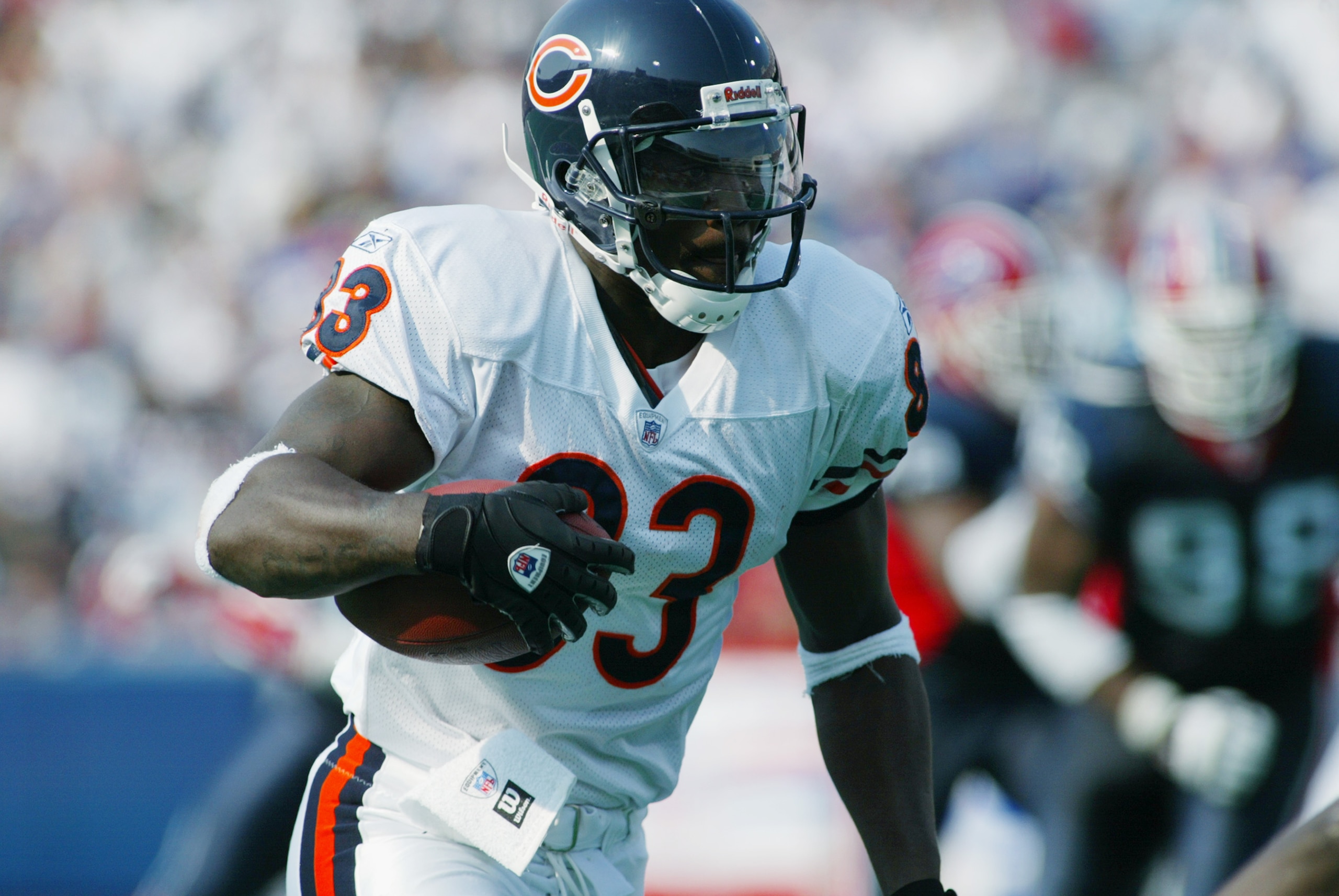 ORCHARD PARK, NY - SEPTEMBER 29:  David Terrell #83 of the Chicago Bears runs with the ball during their NFL game against the Buffalo Bills on September 29, 2002 at Ralph Wilson Stadium in Orchard Park, New York.The Bills defeated the Bears in overtime 33