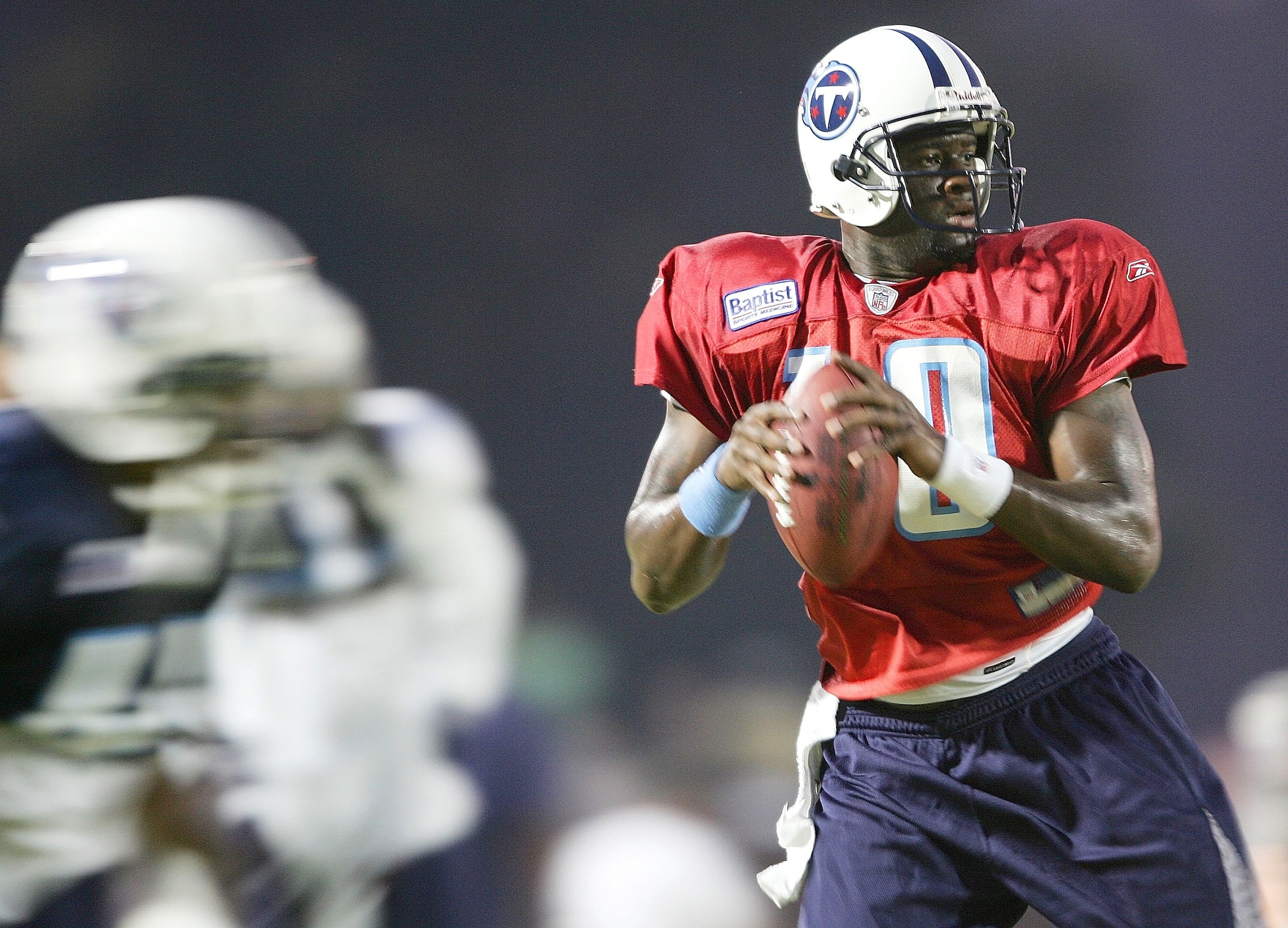 CLARKSVILLE, TN - JULY 31:  Quarterback Vince Young #10 of the Titans looks to pass during the Tennessee Titans Training Camp on July 31,2006 at Austin Peay State University in Clarksville,Tennessee.  (Photo by Elsa/Getty Images)