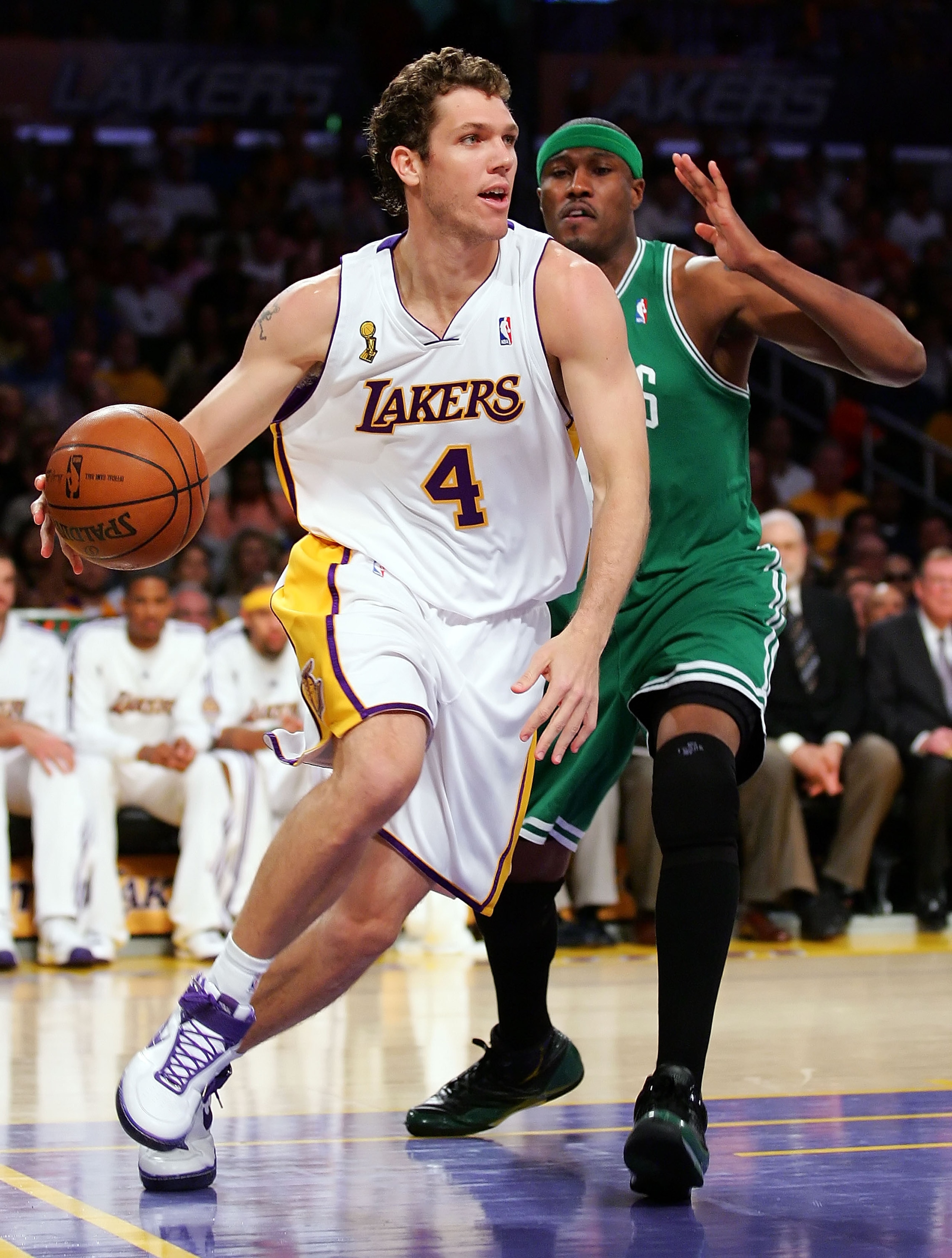 LOS ANGELES, CA - JUNE 15:  Luke Walton #4 of the Los Angeles Lakers drives on James Posey #41 of the Boston Celtics in Game Five of the 2008 NBA Finals on June 15, 2008 at Staples Center in Los Angeles, California. NOTE TO USER: User expressly acknowledg