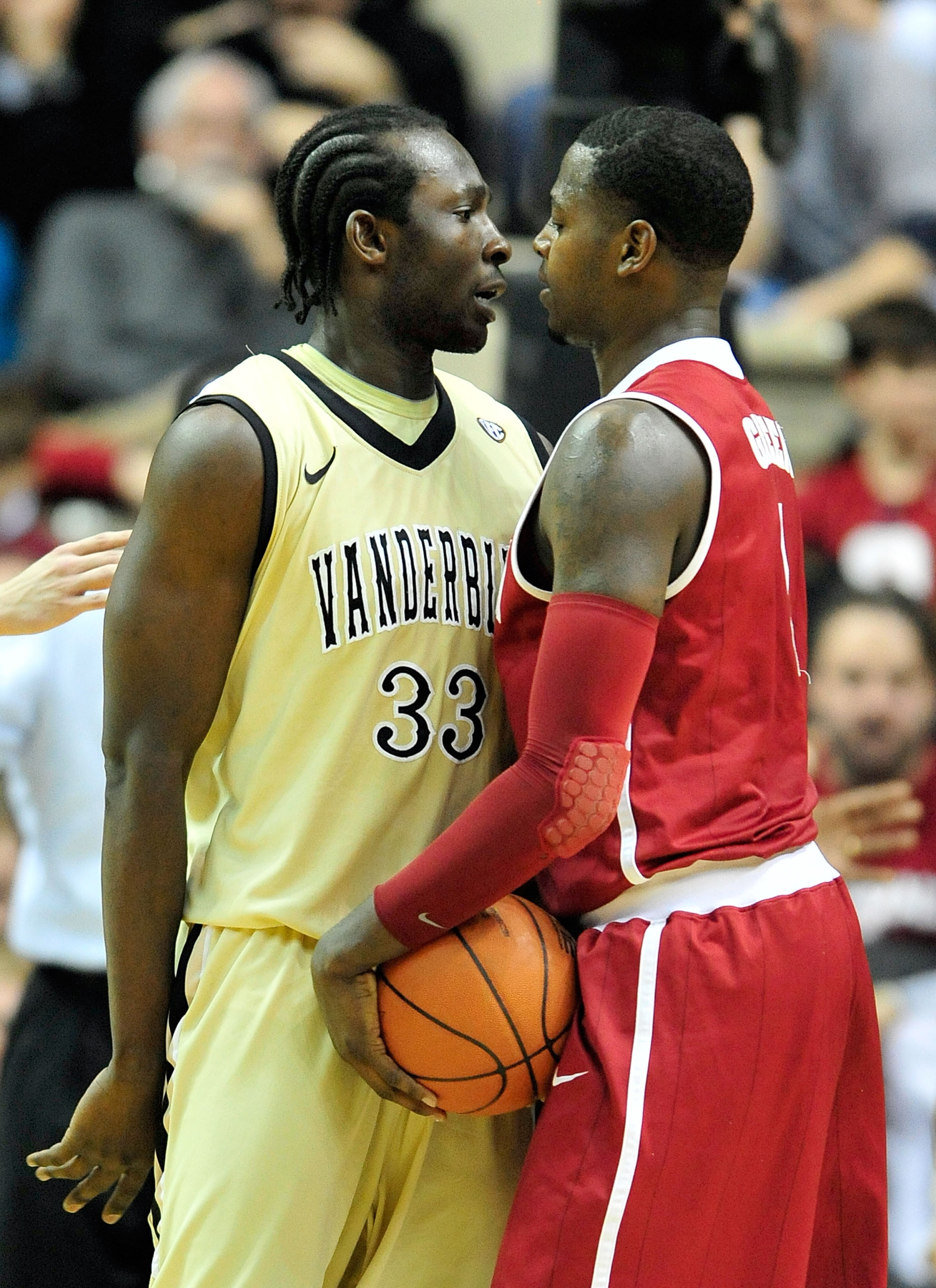 NASHVILLE, TN - FEBRUARY 10: Steve Tchiengang #33 of the Vanderbilt Commodores and JaMychal Green #1 of the Alabama Crimson Tide exchange words at Memorial Gym on February 10, 2011 in Nashville, Tennessee. Vanderbilt won 81-77. (Photo by Grant Halverson/ NASHVILLE, TN - FEBRUARY 10: Steve Tchiengang #33 of the Vanderbilt Commodores and JaMychal Green #1 of the Alabama Crimson Tide exchange words at Memorial Gym on February 10, 2011 in Nashville, Tennessee. Vanderbilt won 81-77. (Photo by Grant Halverson/