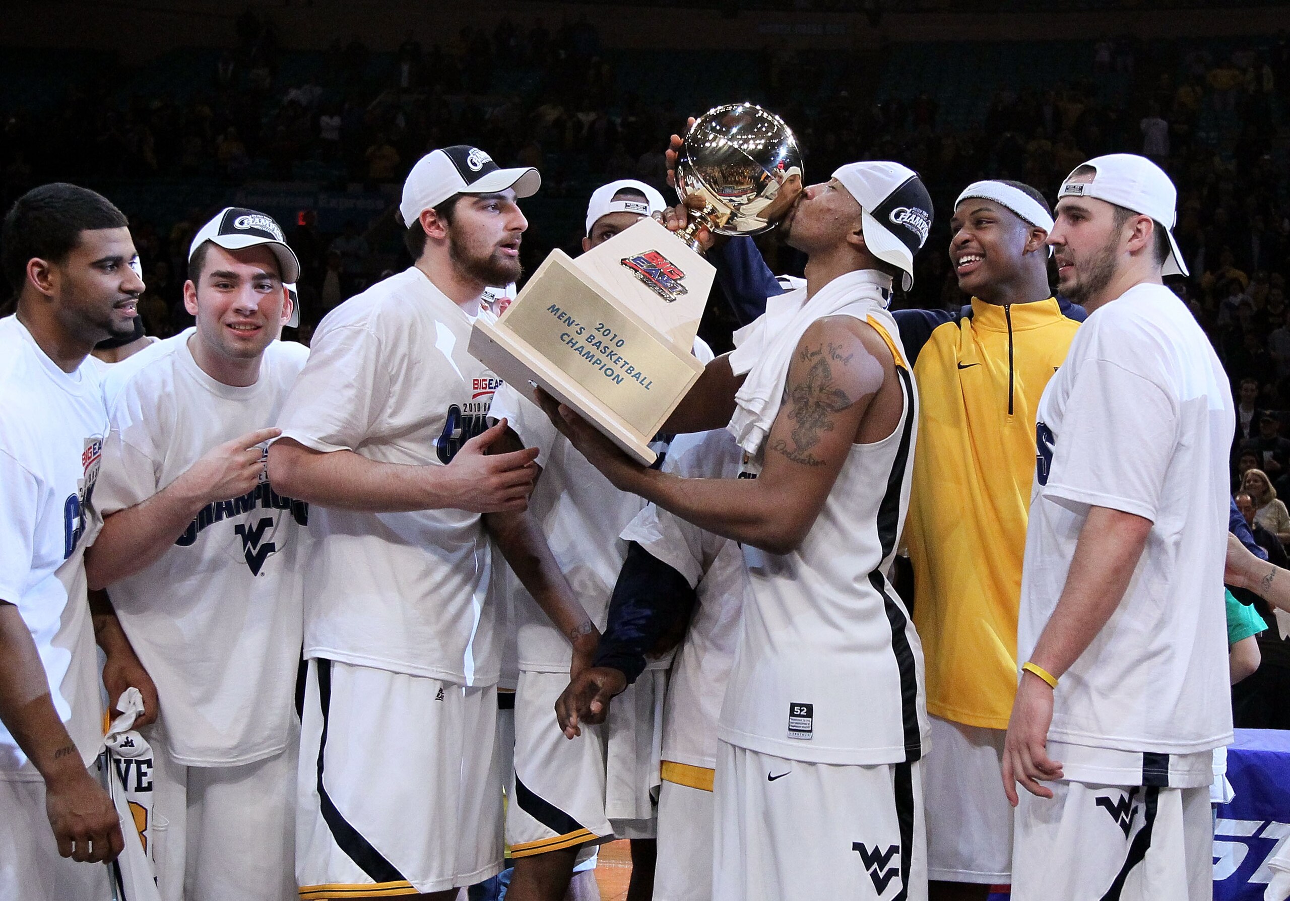 NEW YORK - MARCH 13: Da'Sean Butler #1 of the West Virginia Mountaineers kisses the championship trophy after defeating the Georgetown Hoyas during the championship of the 2010 NCAA Big East Tournament at Madison Square Garden on March 13, 2010 in New Yor NEW YORK - MARCH 13: Da'Sean Butler #1 of the West Virginia Mountaineers kisses the championship trophy after defeating the Georgetown Hoyas during the championship of the 2010 NCAA Big East Tournament at Madison Square Garden on March 13, 2010 in New Yor