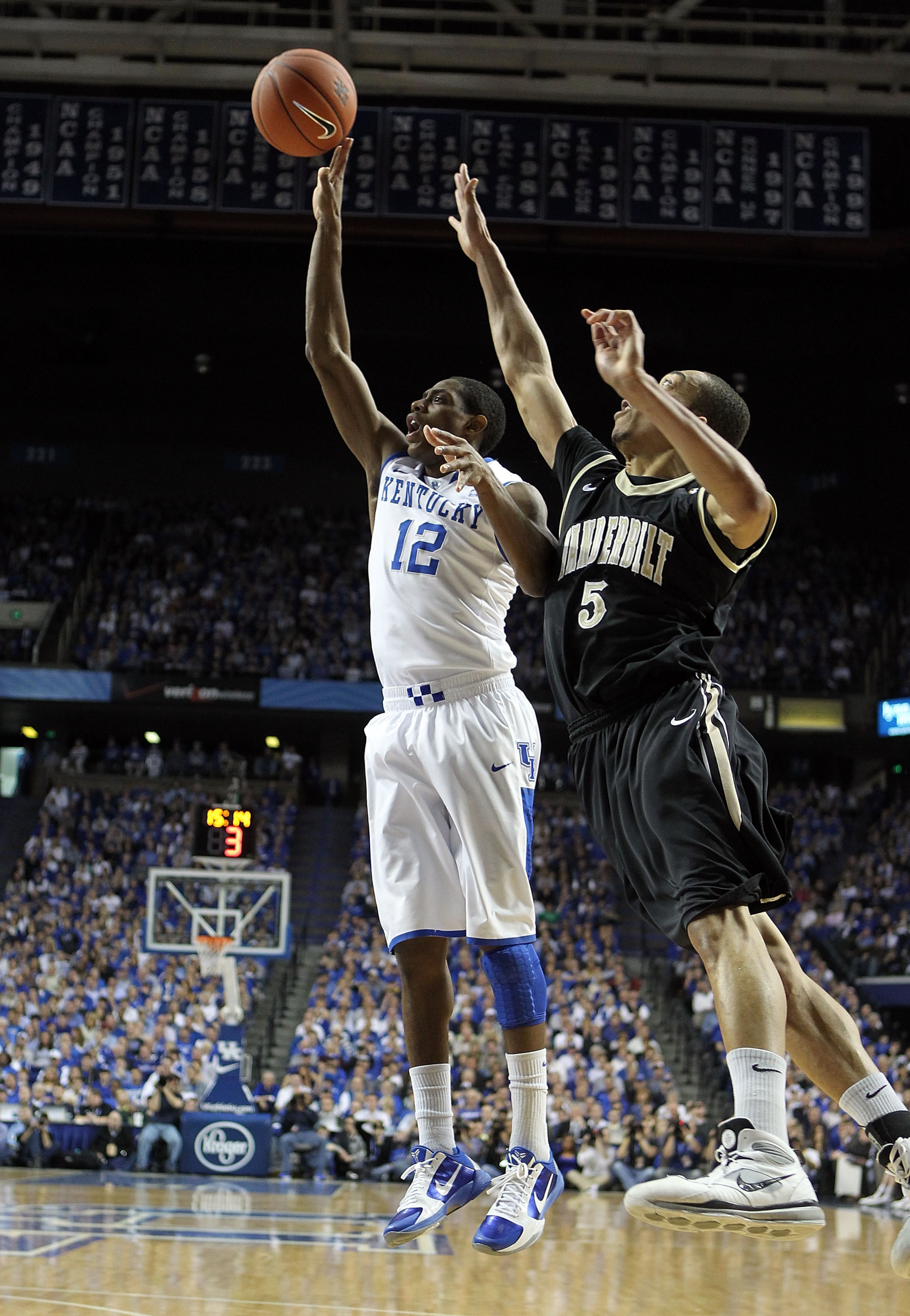 LEXINGTON, KY - MARCH 01:  Brandon Knight #12 of the Kentucky Wildcats shoots the ball while defended by Lance Goulbourne #5 of the Vanderbilt Commodores  during the Kentucky 68-66 win in the SEC game at Rupp Arena on March 1, 2011 in Lexington, Kentucky.