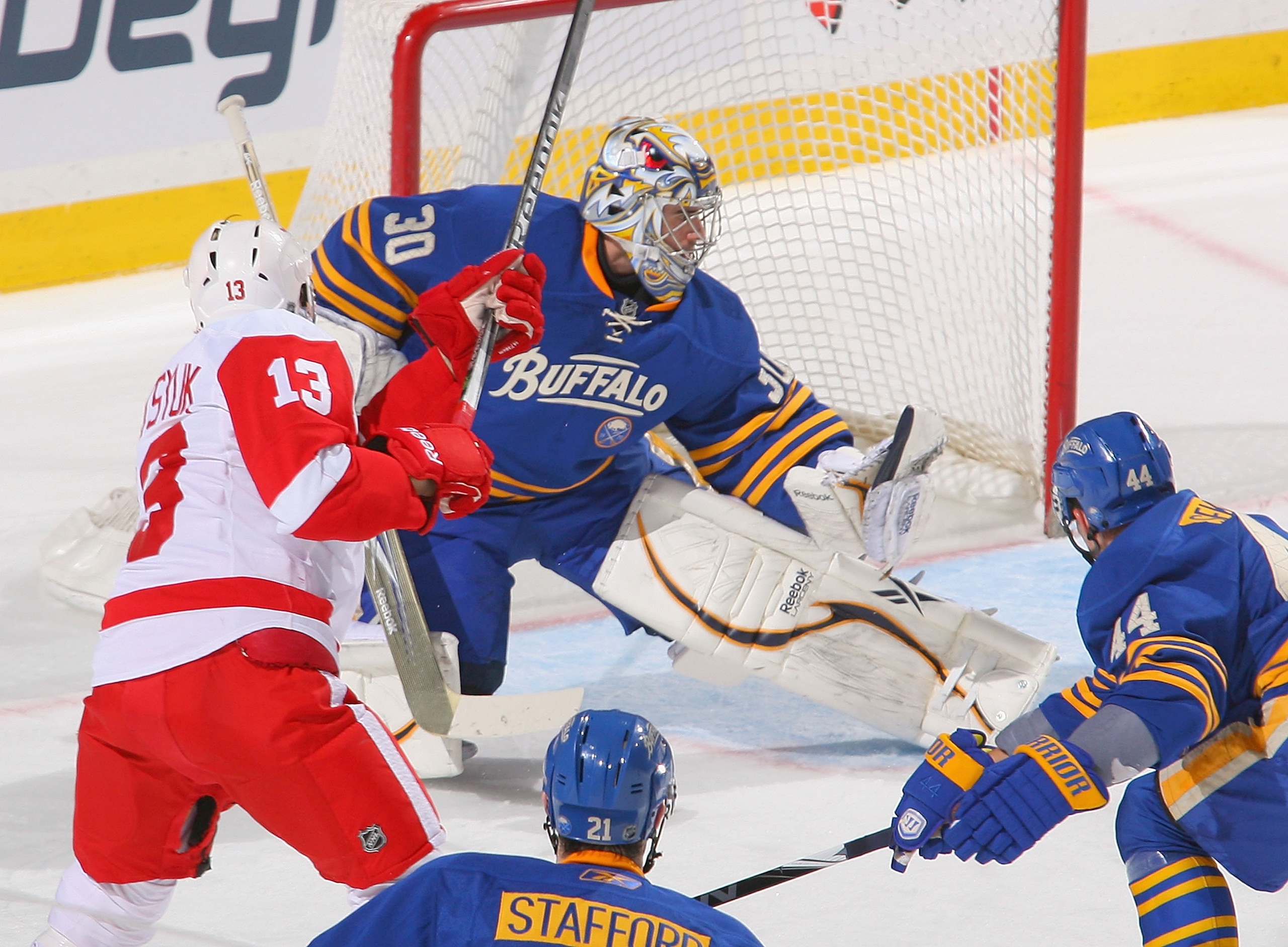 BUFFALO, NY - FEBRUARY 26:  Ryan Miller #30  of the Buffalo Sabres makes a save on Pavel Datsyuk #13 of the Detroit Red Wings at HSBC Arena on February 26, 2011 in Buffalo, New York. Detroit won 3-2 in a shootout.  (Photo by Rick Stewart/Getty Images)
