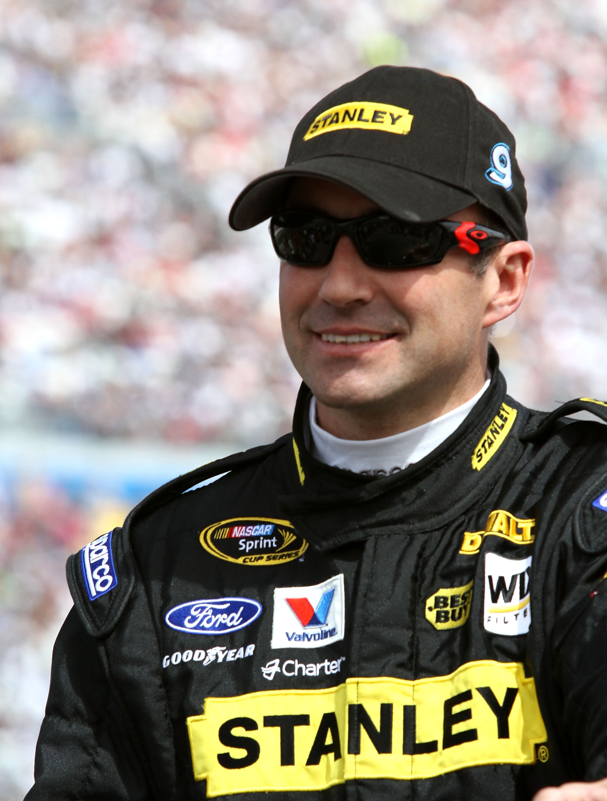 LAS VEGAS, NV - MARCH 06:  Marcos Ambrose, driver of the #9 Stanley Ford, stands on the grid prior to the NASCAR Sprint Cup Series Kobalt Tools 400 at Las Vegas Motor Speedway on March 6, 2011 in Las Vegas, Nevada.  (Photo by Jerry Markland/Getty Images f