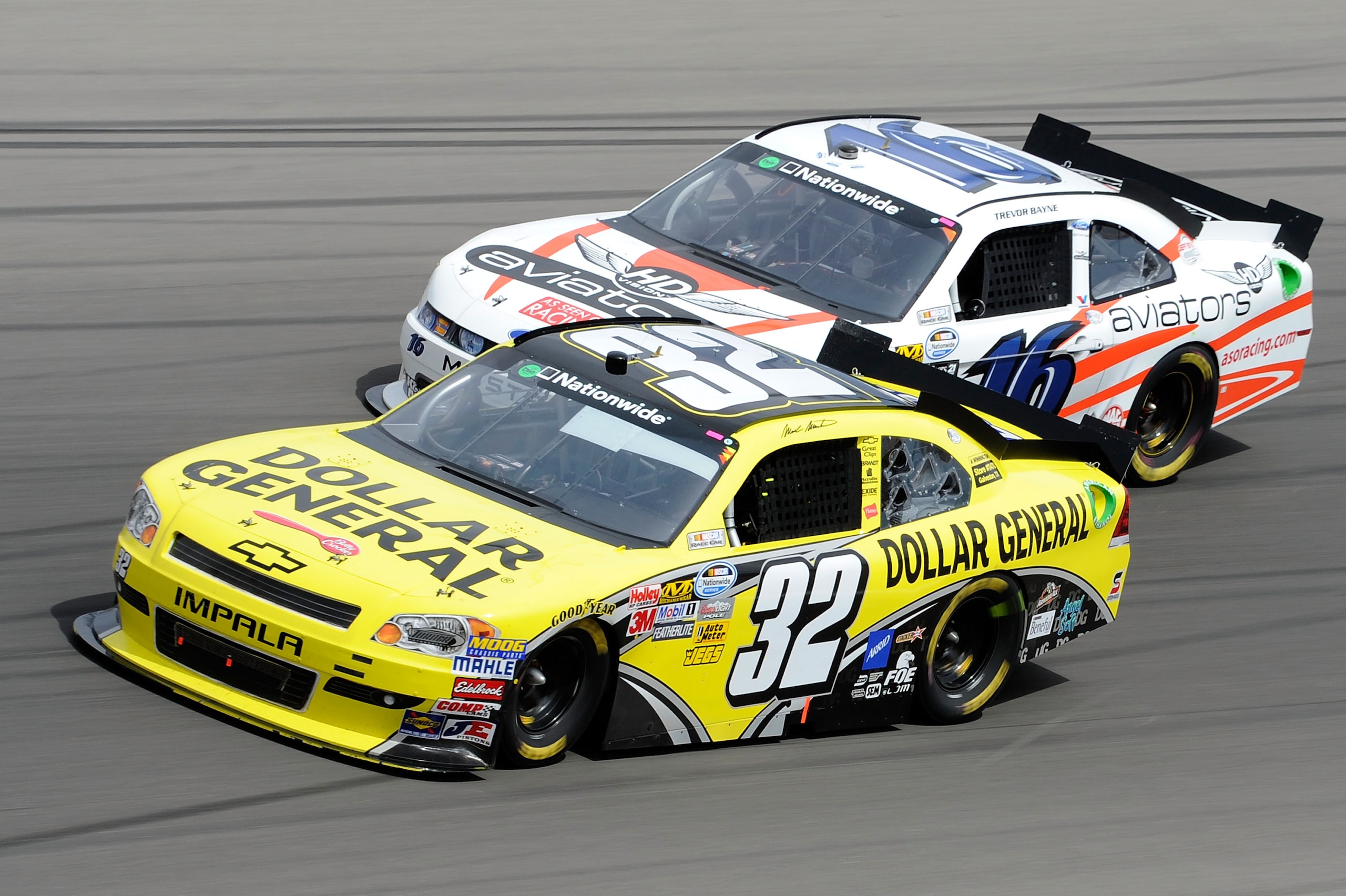 LAS VEGAS, NV - MARCH 05:  Mark Martin, driver of the #32 Dollar General Chevrolet, races Trevor Bayne, driver of the #16 As Seen On TV HD Vision Aviators Ford, during the NASCAR Nationwide Series Sam's Town 300 at Las Vegas Motor Speedway on March 5, 201
