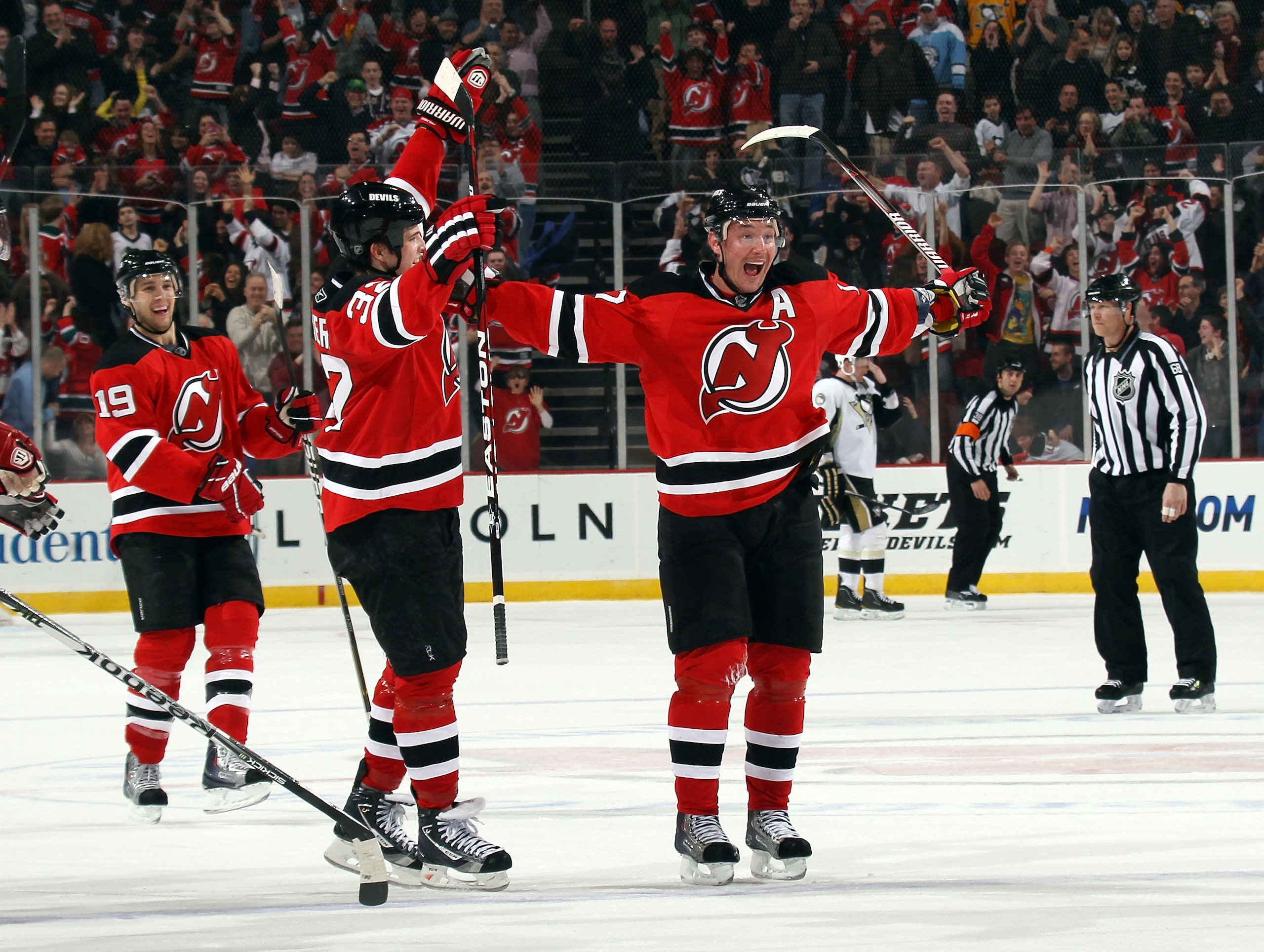 NEWARK, NJ - MARCH 04:  Ilya Kovalchuk #17 of the New Jersey Devils celebrates his game winning goal at 4:35 of overtime against the Pittsburgh Penguins at  at the Prudential Center on March 4, 2011 in Newark, New Jersey.  (Photo by Bruce Bennett/Getty Im