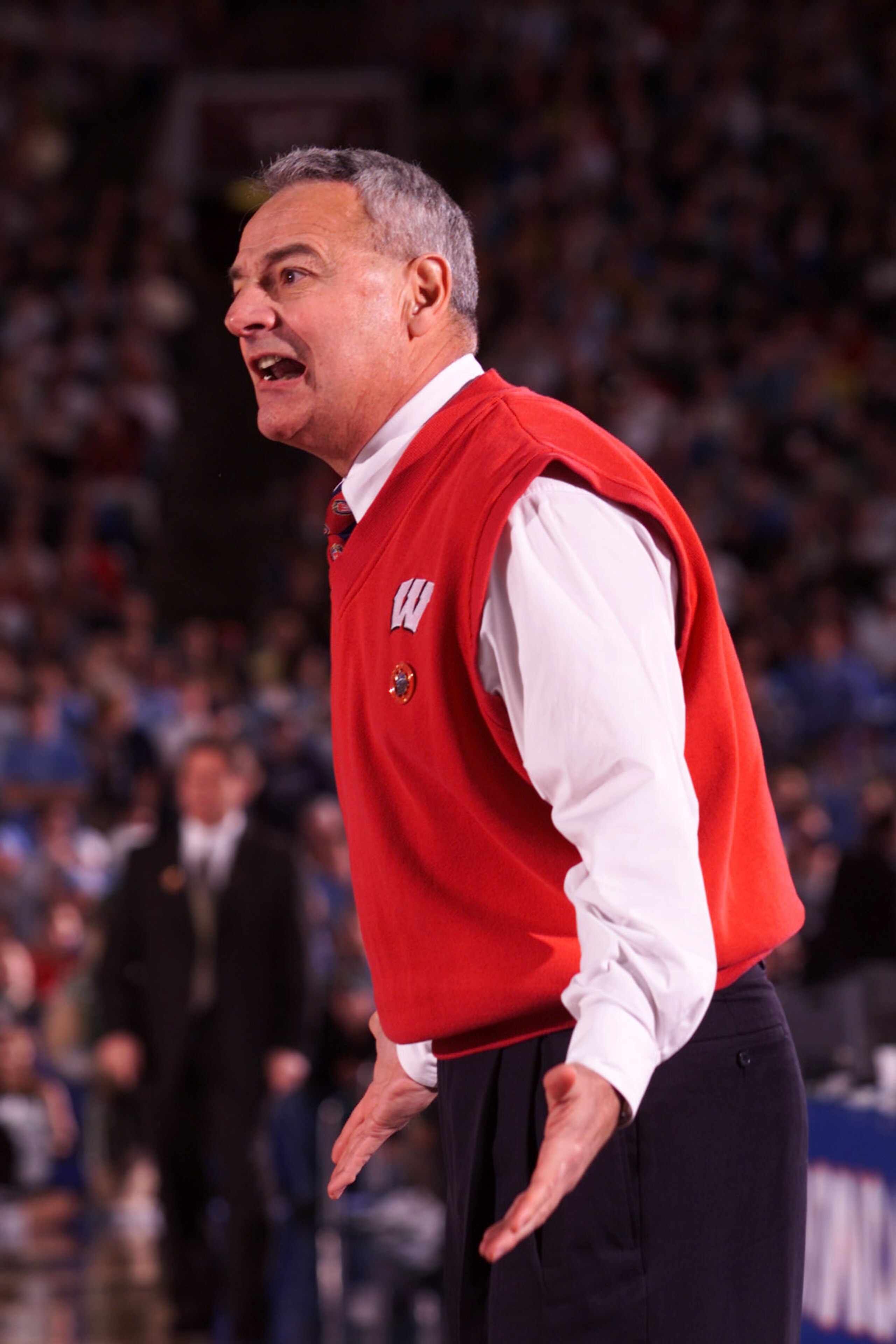 1 Apr 2000:  Head coach Dick Bennett of Wisconsin shouts out instructions to his team during the semifinal round of the NCAA Final Four against Michigan State at the RCA Dome in Indianapolis, Indiana.  DIGITAL IMAGE Mandatory Credit: Jed Jacobsohn/ALLSPOR