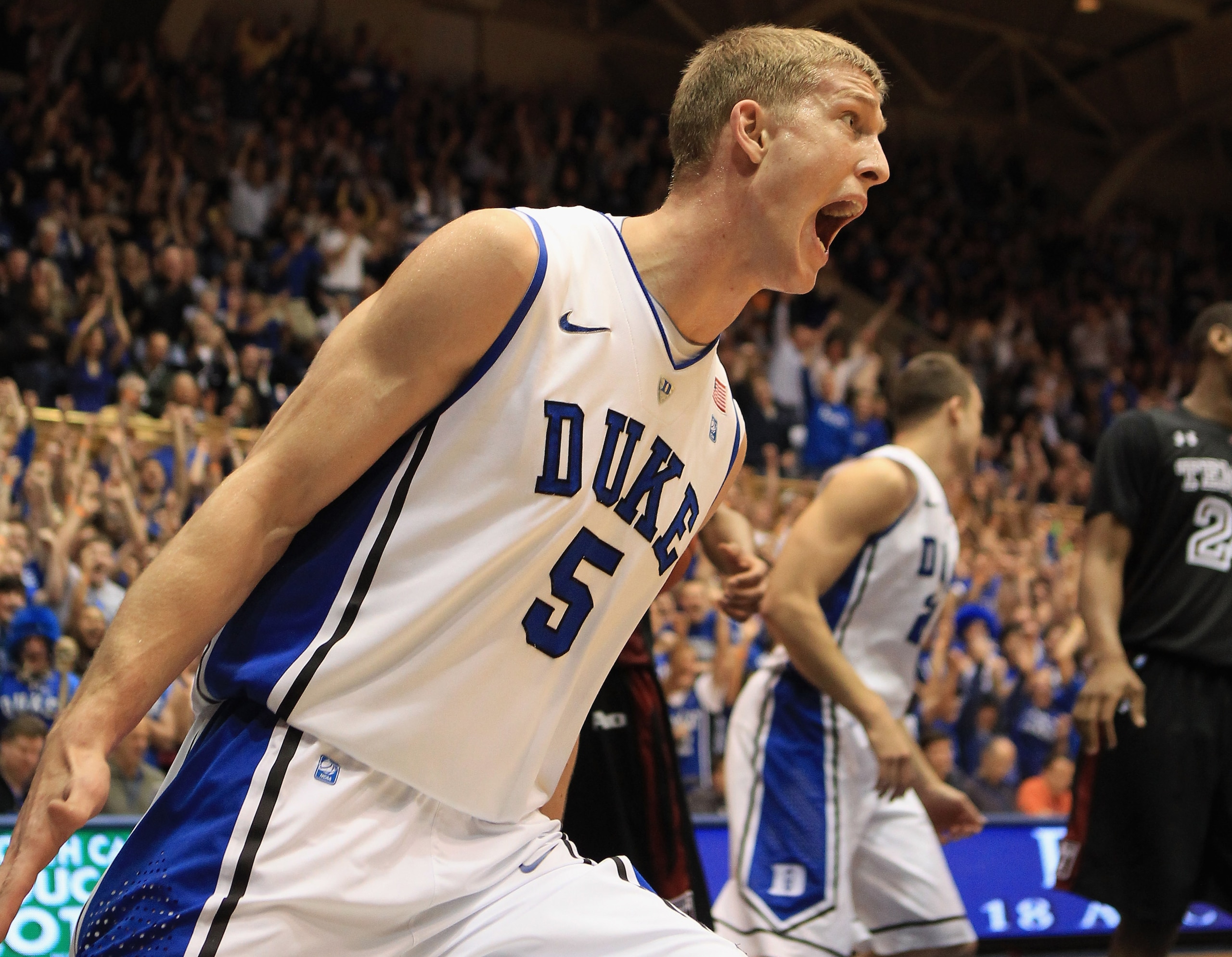 DURHAM, NC - FEBRUARY 23:  Mason Plumlee #5 of the Duke Blue Devils celebrates after a dunk on their way to a 78-61 victory over the Temple Owls at Cameron Indoor Stadium on February 23, 2011 in Durham, North Carolina.  (Photo by Streeter Lecka/Getty Imag
