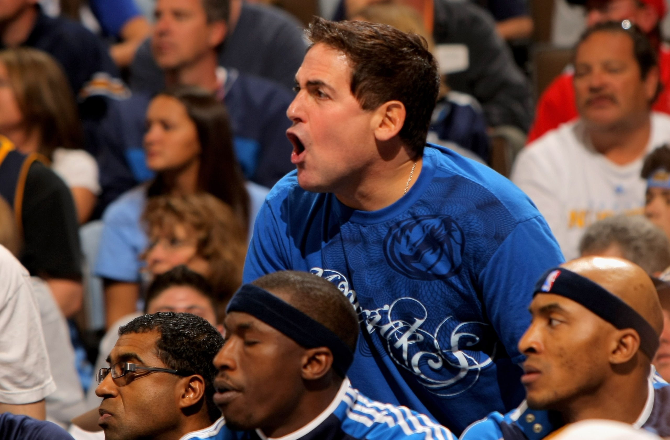 DENVER - MAY 03:  Mark Cuban, owner of the Dallas Mavericks, reacts from behind the team bench as they face the Denver Nuggets in Game One of the Western Conference Semifinals during the 2009 NBA Playoffs at Pepsi Center on May 3, 2009 in Denver, Colorado