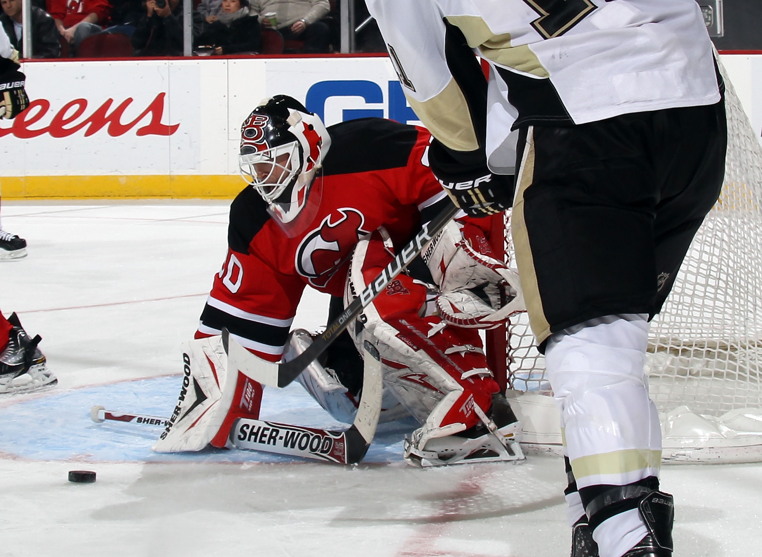 NEWARK, NJ - MARCH 04: Martin Brodeur #30 of the New Jersey Devils tends net against the Pittsburgh Penguins at the Prudential Center on March 4, 2011 in Newark, New Jersey. The Devils defeated the Penguins 2-1 in overtime.  (Photo by Bruce Bennett/Getty