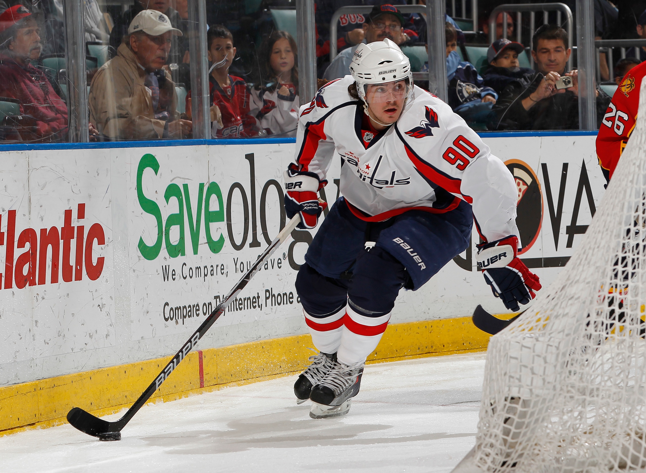 SUNRISE, FL - MARCH 6: Marcus Johansson #90 of the Washington Capitals carries the puck behind the Florida Panthers net on March 6, 2011 at the BankAtlantic Center in Sunrise, Florida. (Photo by Joel Auerbach/Getty Images)