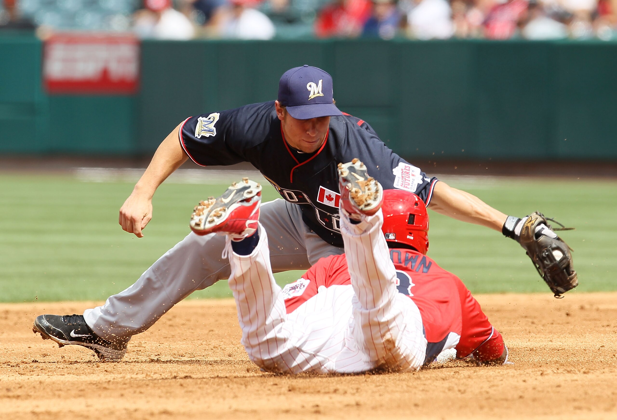 ANAHEIM, CA - JULY 11:  U.S. Futures All-Star Domonic Brown #3 of the Philadelphia Phillies slides into second base safely during the 2010 XM All-Star Futures Game at Angel Stadium of Anaheim on July 11, 2010 in Anaheim, California.  (Photo by Stephen Dun