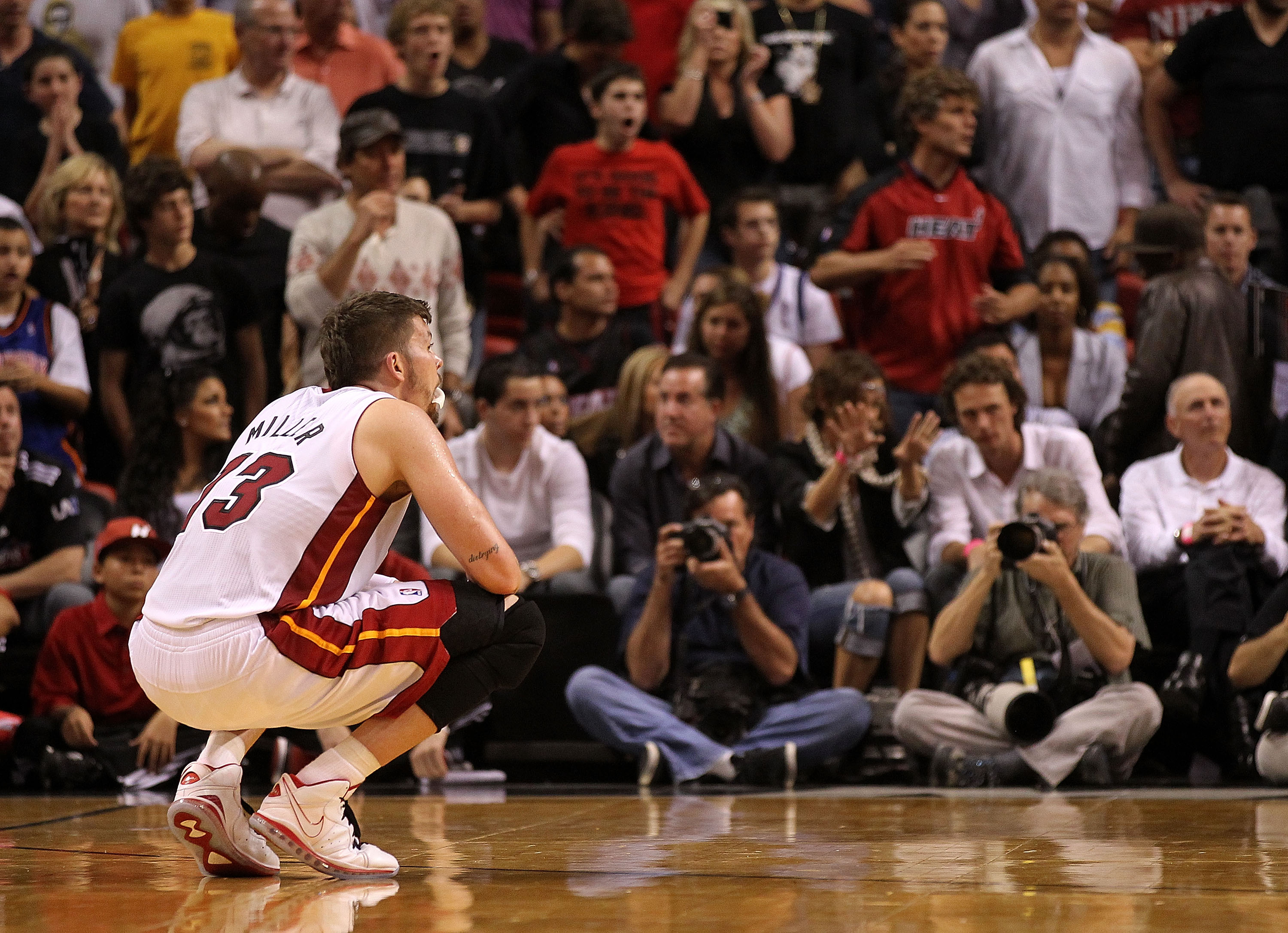 MIAMI, FL - FEBRUARY 27: Mike Miller #13 of the Miami Heat looks on during a game gainst the New York Knicks at American Airlines Arena on February 27, 2011 in Miami, Florida. NOTE TO USER: User expressly acknowledges and agrees that, by downloading and/o MIAMI, FL - FEBRUARY 27: Mike Miller #13 of the Miami Heat looks on during a game gainst the New York Knicks at American Airlines Arena on February 27, 2011 in Miami, Florida. NOTE TO USER: User expressly acknowledges and agrees that, by downloading and/o