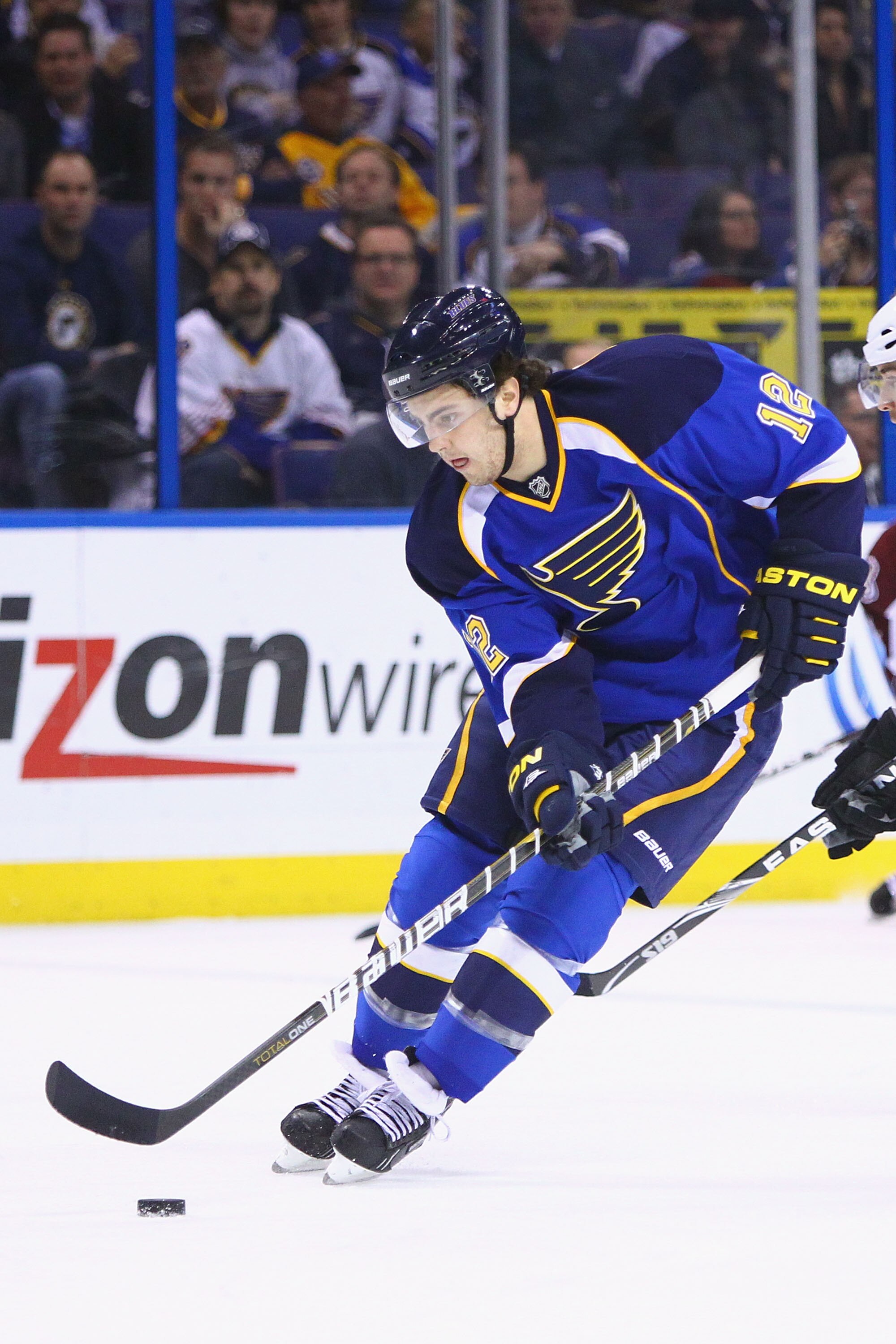 ST. LOUIS, MO - FEBRUARY 22: Kevin Shattenkirk #12 of the St. Louis Blues moves the puck up ice against the Colorado Avalanche at the Scottrade Center on February 22, 2011 in St. Louis, Missouri.  (Photo by Dilip Vishwanat/Getty Images)