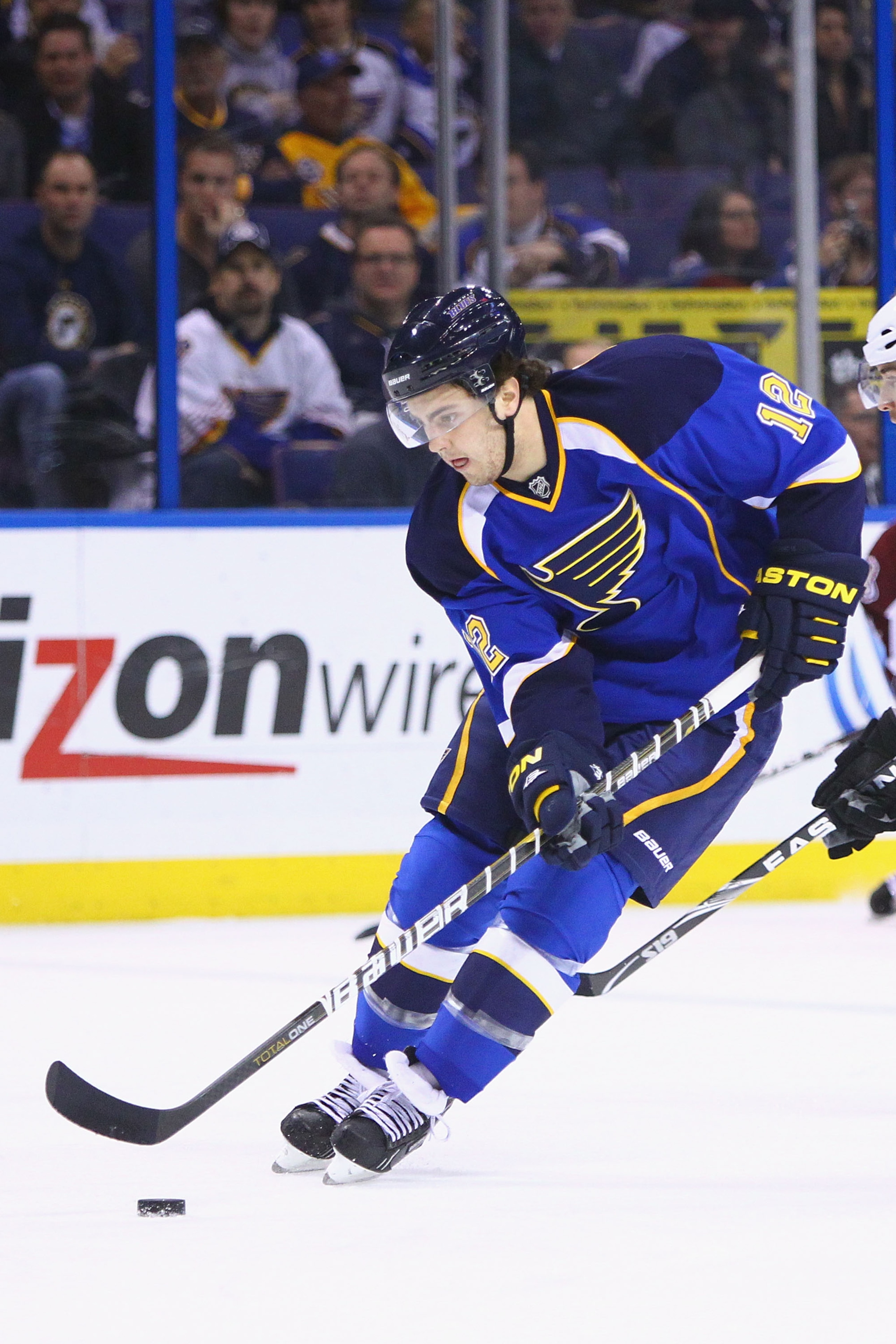 ST. LOUIS, MO - FEBRUARY 22: Kevin Shattenkirk #12 of the St. Louis Blues moves the puck up ice against the Colorado Avalanche at the Scottrade Center on February 22, 2011 in St. Louis, Missouri.  (Photo by Dilip Vishwanat/Getty Images)