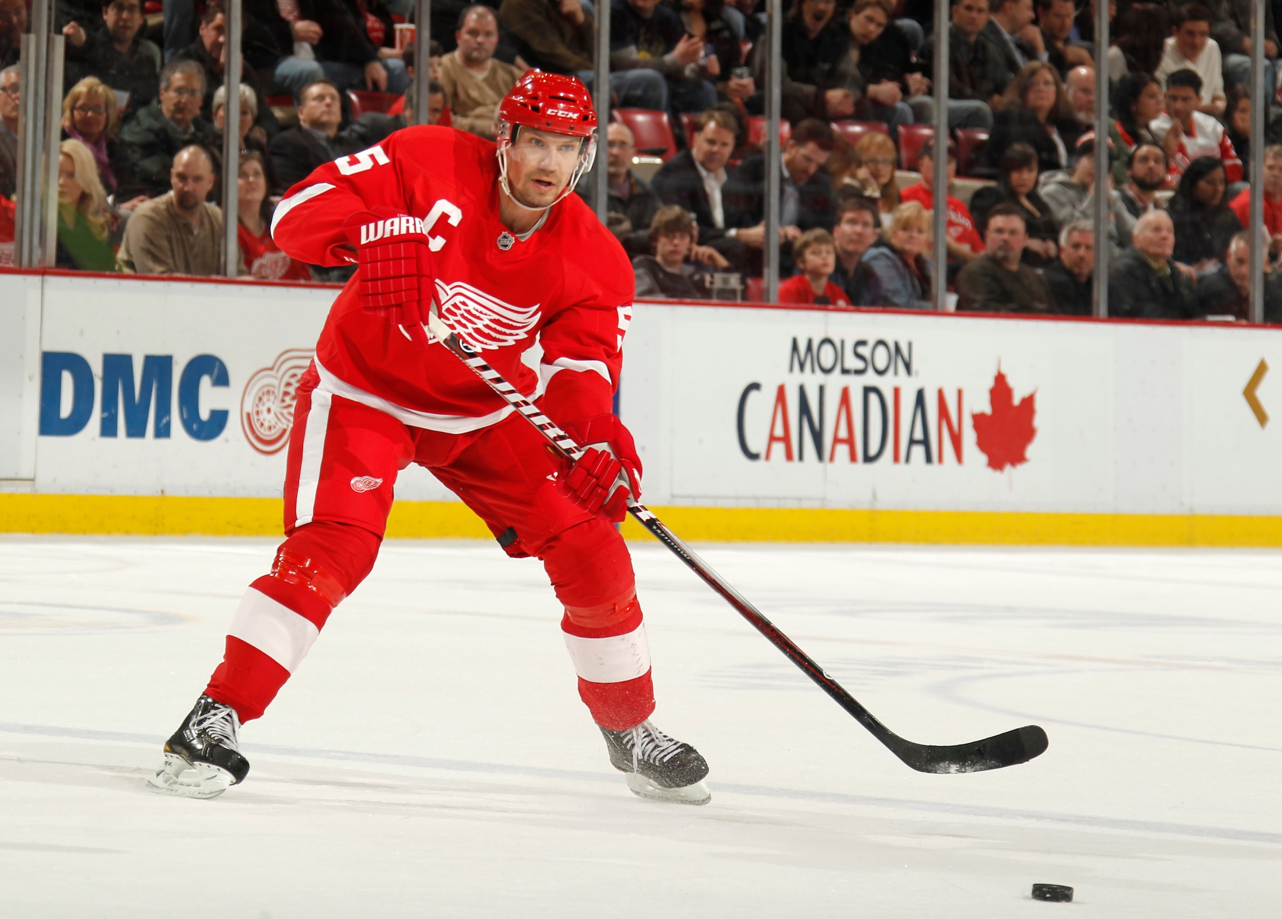 DETROIT, MI - FEBRUARY 24:  Nicklas Lidstrom #5 of the Detroit Red Wings skates with the puck while playing against the Dallas Stars on February 24, 2011 at Joe Louis Arena in Detroit, Michigan.  (Photo by Gregory Shamus/Getty Images)