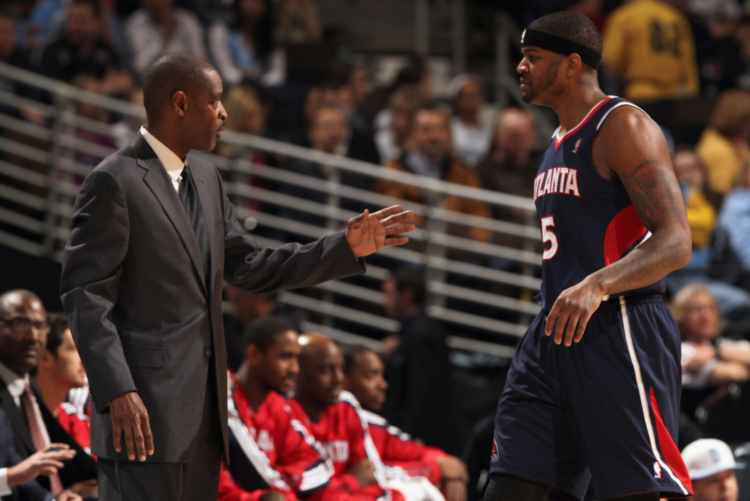 DENVER, CO - FEBRUARY 28:  Head coach Larry Drew of the Atlanta Hawks directs Josh Smith #5 against the Denver Nuggets during NBA action at the Pepsi Center on February 28, 2011 in Denver, Colorado. The Nuggets deafeated the Hawks 100-90. NOTE TO USER: Us