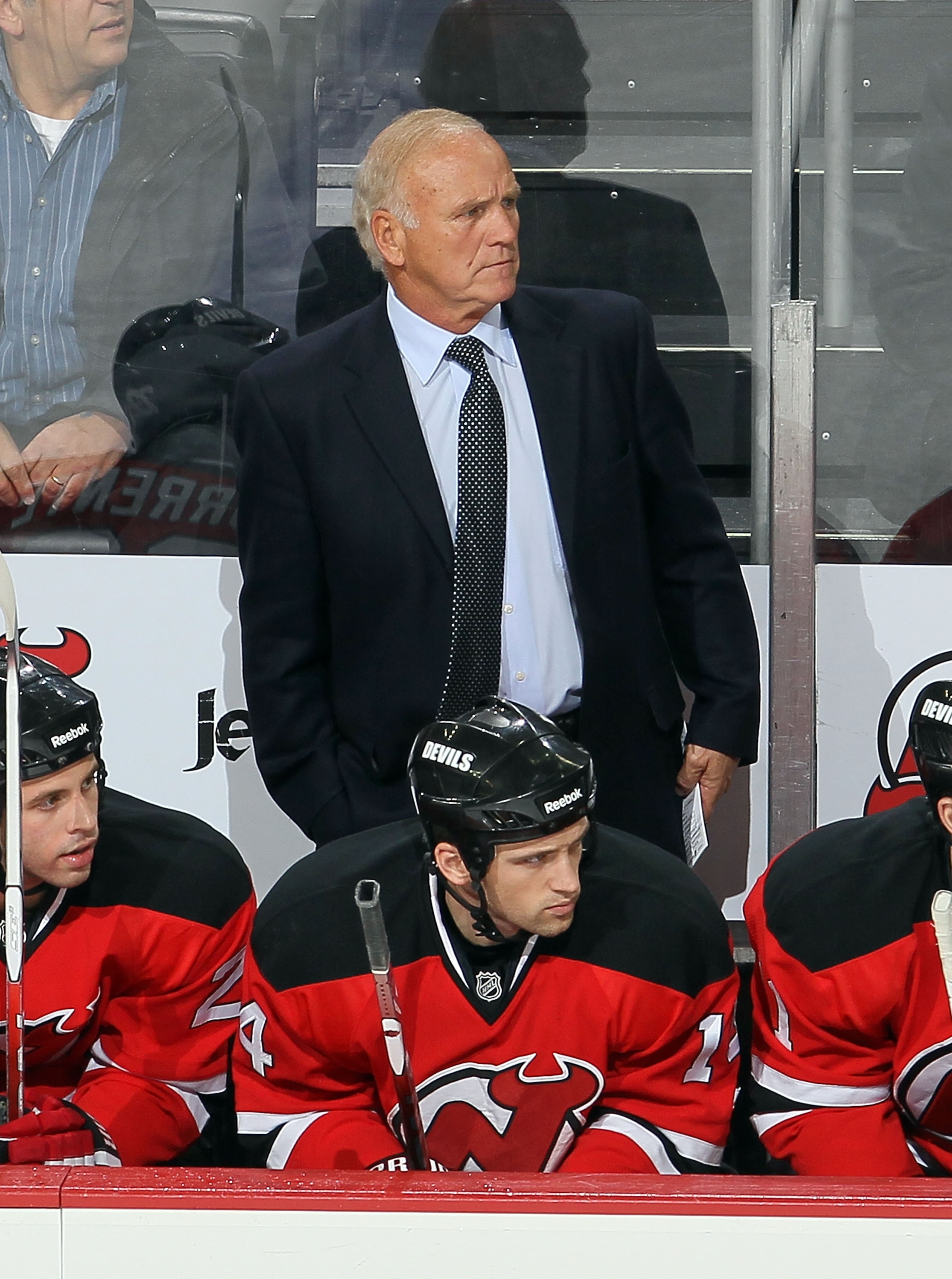 NEWARK, NJ - DECEMBER 23:  Head coach Jacques Lemaire of the New Jersey Devils looks on against the New York Islanders at the Prudential Center on December 23, 2010 in Newark, New Jersey.  (Photo by Jim McIsaac/Getty Images)