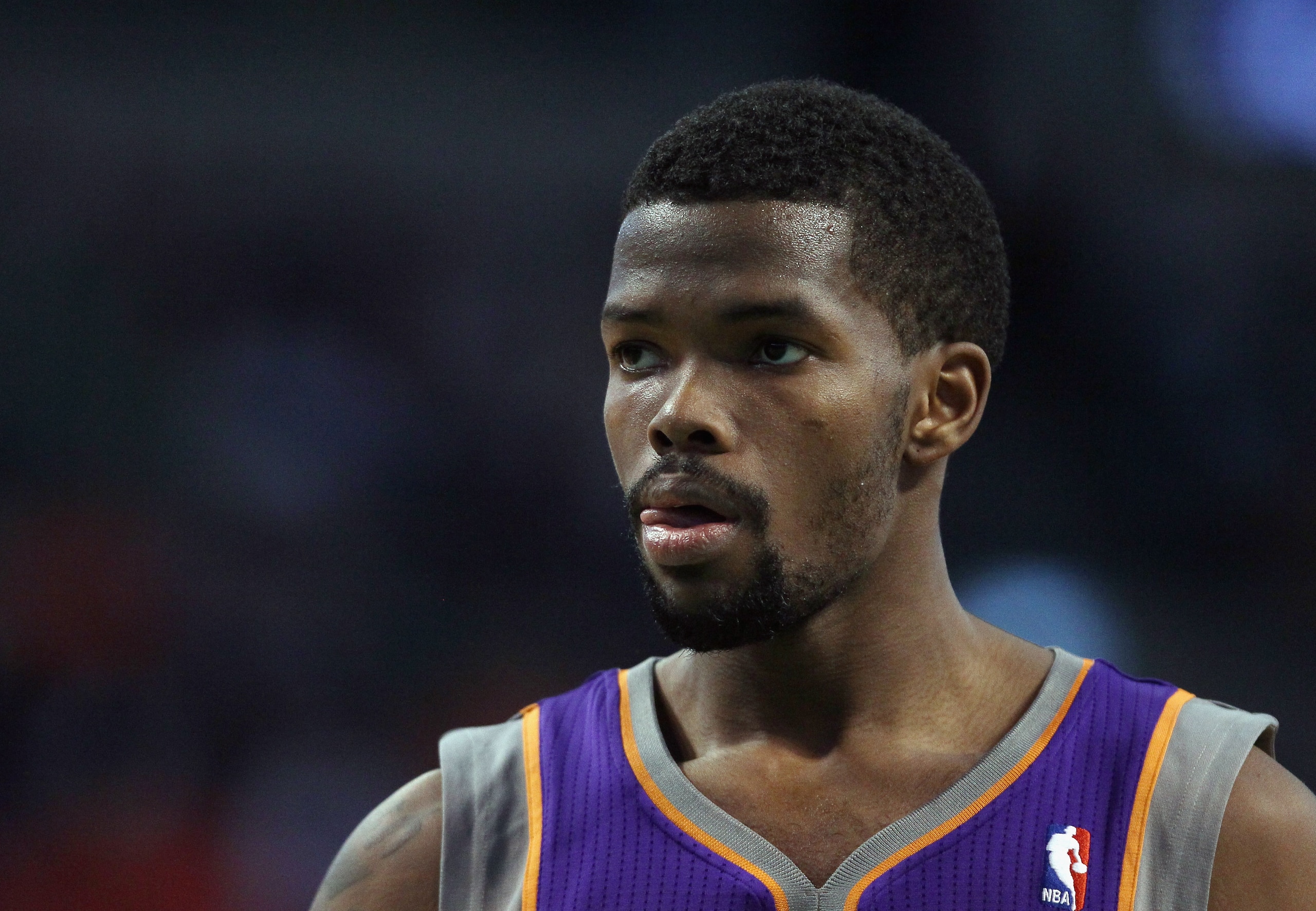 BOSTON, MA - MARCH 02:  Aaron Brooks #0 of the Phoenix Suns looks on before a free throw against the Boston Celtics on March 2, 2011 at the TD Garden in Boston, Massachusetts.  The Celtics defeated the Suns 115-103. NOTE TO USER: User expressly acknowledg