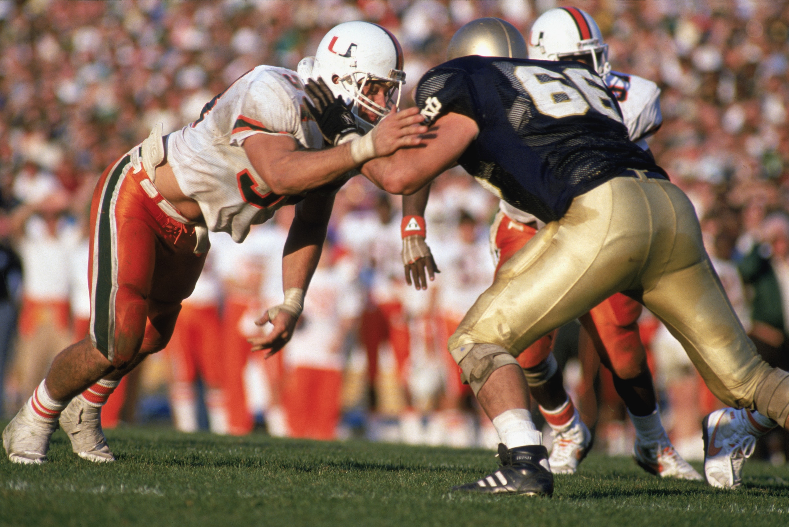 MIAMI - OCTOBER 15: Bill Hawkins #54 of the University of Miami Hurricanes moves on the field during a game against Notre Dame Fighting Irish on October 15, 1988 in Miami, Florida. Notre Dames won 31-30. (Photo by: Jonathan Daniel/Getty Images) MIAMI - OCTOBER 15: Bill Hawkins #54 of the University of Miami Hurricanes moves on the field during a game against Notre Dame Fighting Irish on October 15, 1988 in Miami, Florida. Notre Dames won 31-30. (Photo by: Jonathan Daniel/Getty Images)