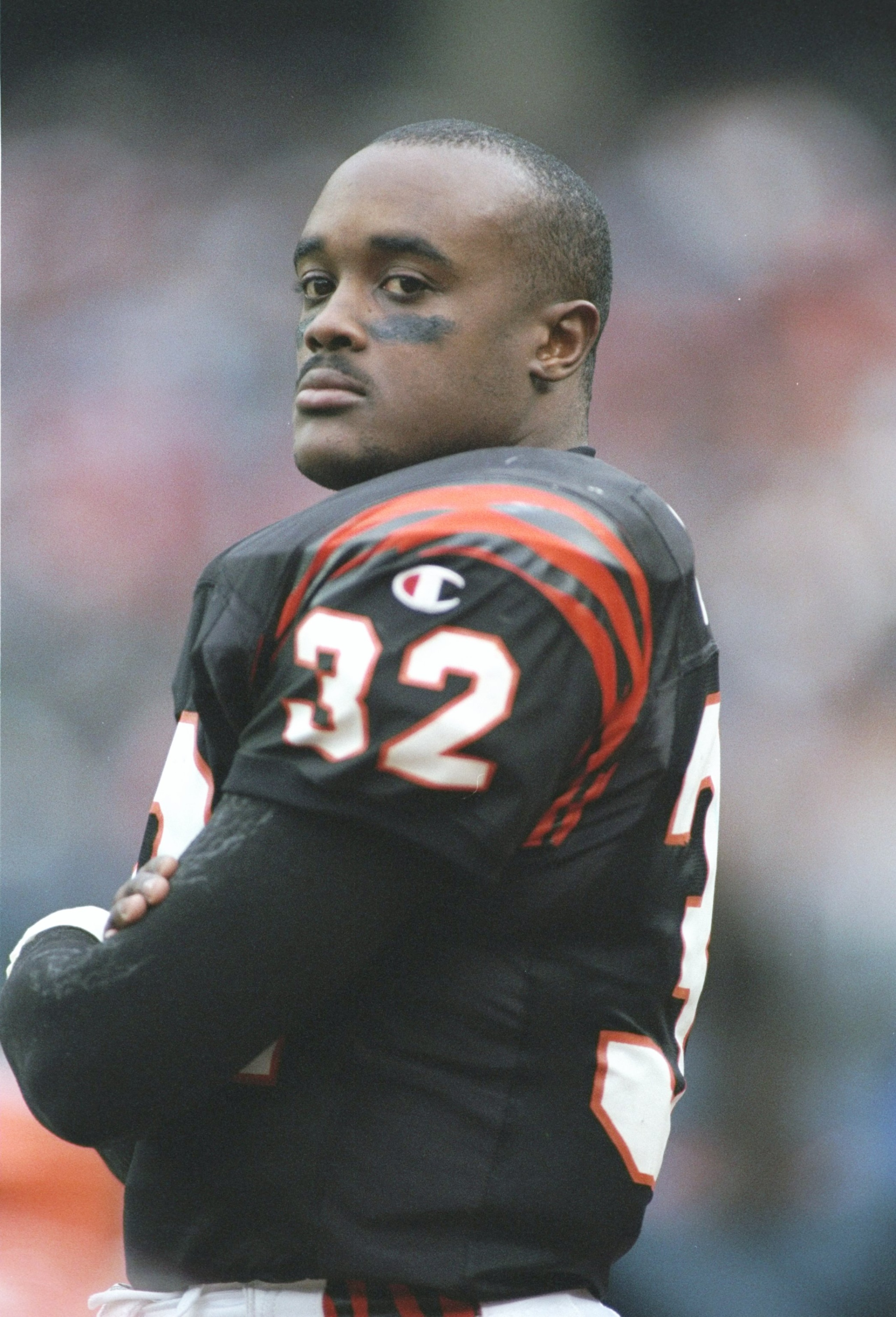 24 Nov 1996:  Runningback Ki-Jana Carter of the Cincinnati Bengals stands on the sidelines during a game against the Atlanta Falcons at Riverfront Stadium in Cincinnati, Ohio.  The Bengals won the game 41-31. Mandatory Credit: Jed Jacobsohn/Allsport