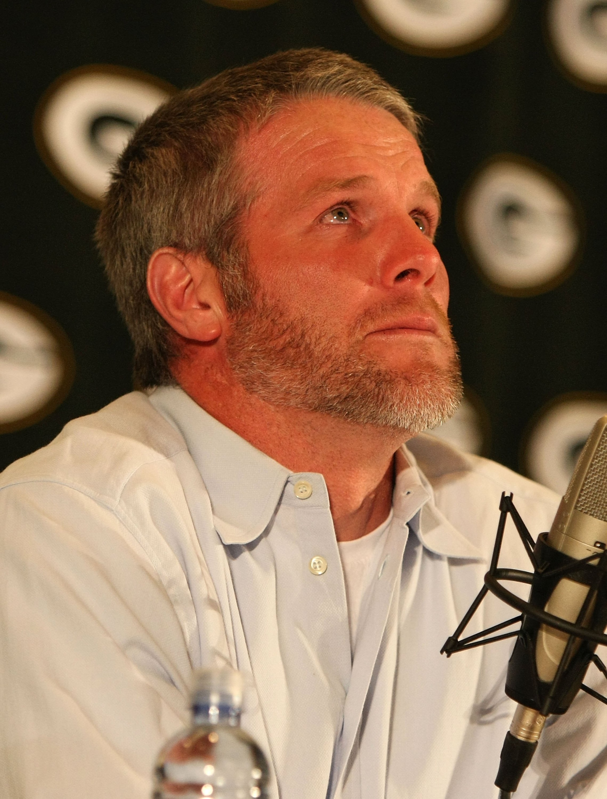 GREEN BAY, WI - MARCH 06: Quarterback Brett Favre of the Green Bay Packers tries to control his emotions at his retirement press conference on March 6, 2008 at Lambeau Field in Green Bay, Wisconsin. (Photo by Jonathan Daniel/Getty Images)