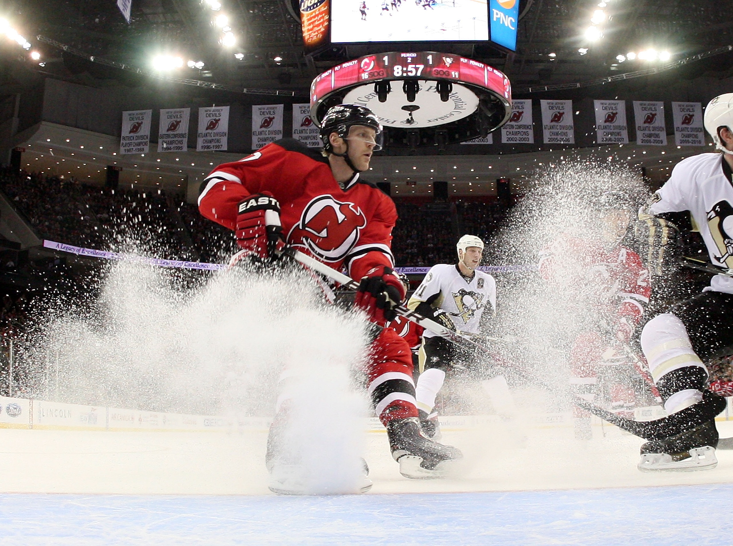 NEWARK, NJ - MARCH 04: Henrik Tallinder #7 of the New Jersey Devils skates against the Pittsburgh Penguins at the Prudential Center on March 4, 2011 in Newark, New Jersey. The Devils defeated the Penguins 2-1 in overtime.  (Photo by Bruce Bennett/Getty Im