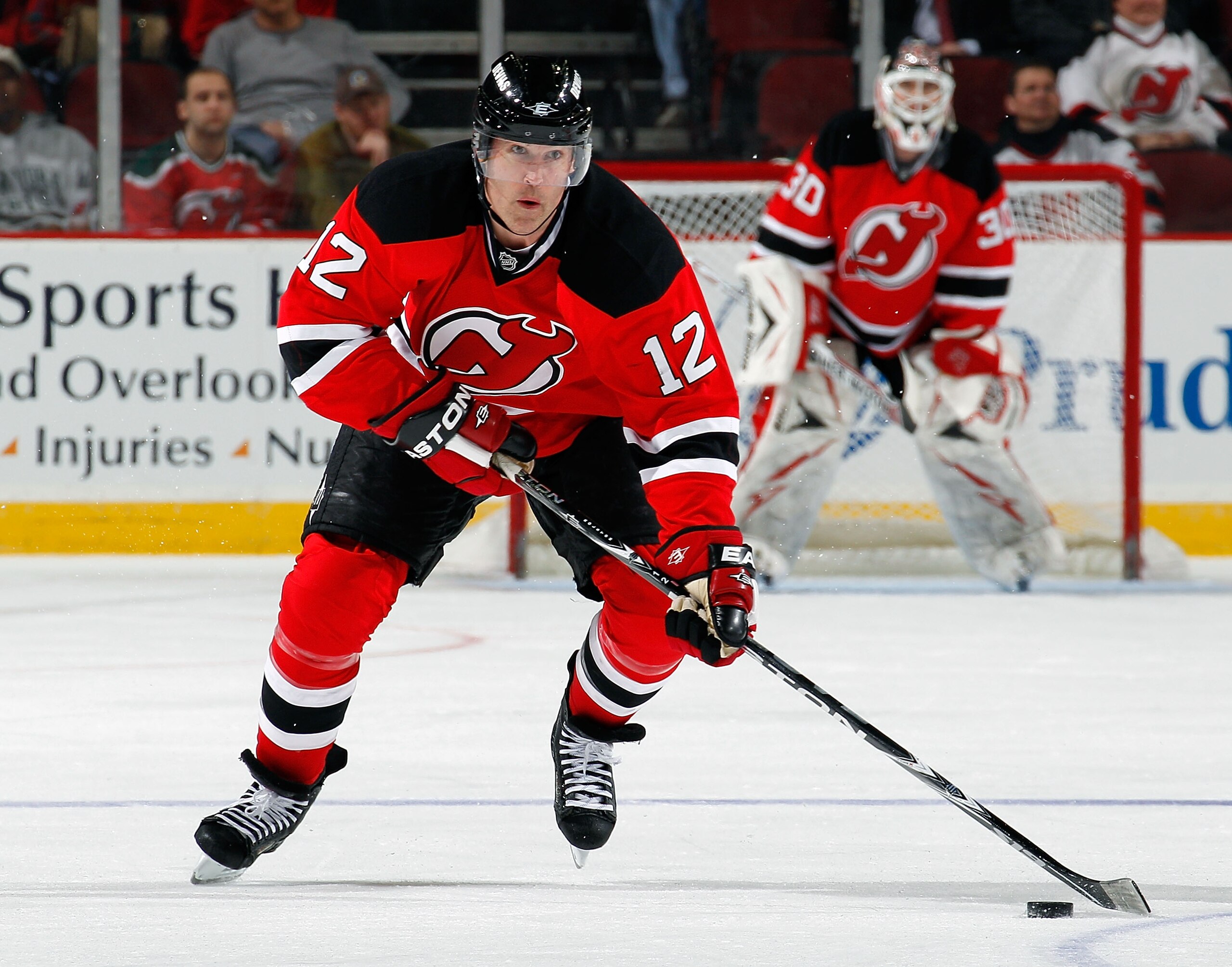 NEWARK, NJ - MARCH 02:  Brian Rolston #12 of the New Jersey Devils skates during an NHL hockey game against the Tampa Bay Lightning at the Prudential Center on March 2, 2011 in Newark, New Jersey.  (Photo by Paul Bereswill/Getty Images)