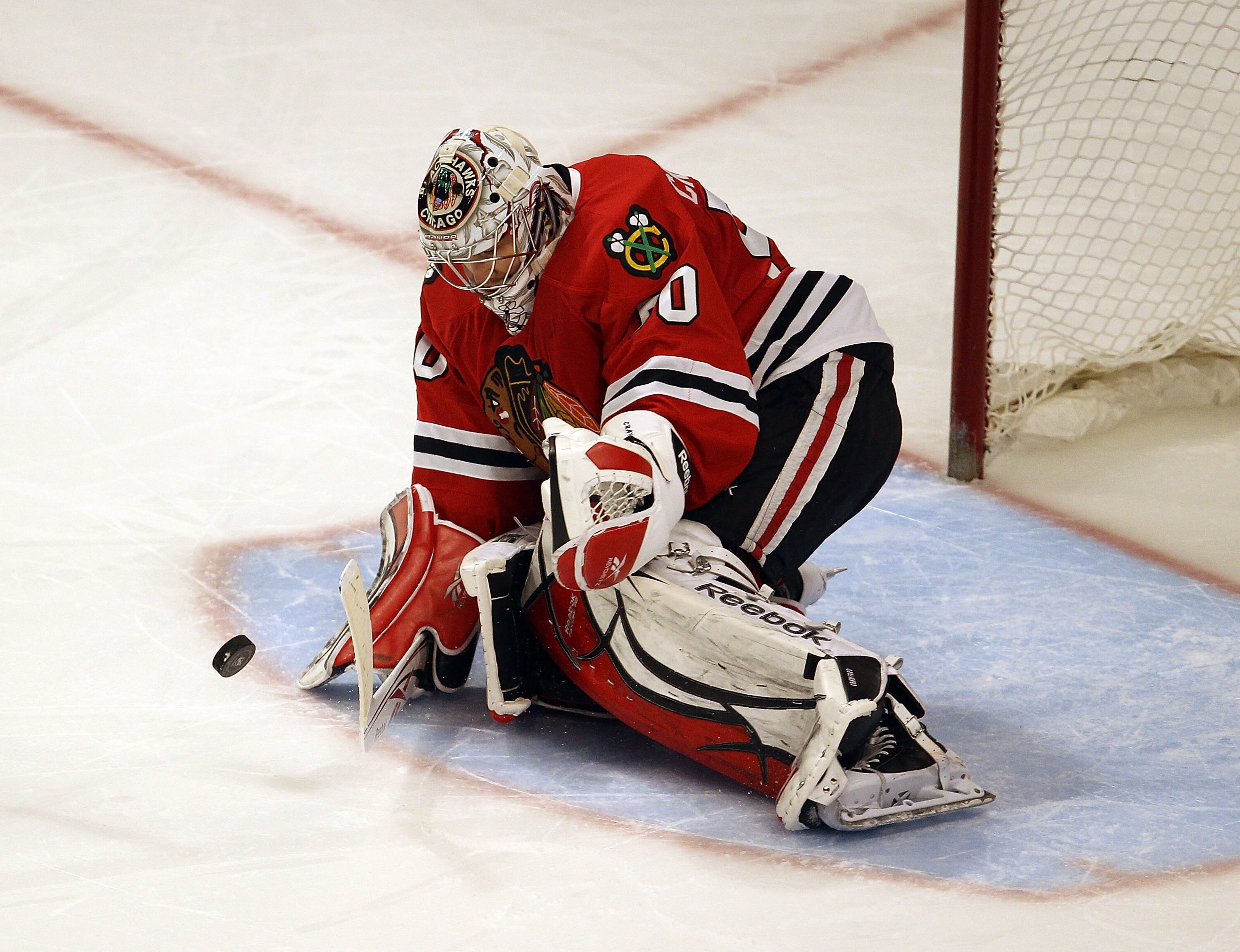 CHICAGO, IL - FEBRUARY 27: Corey Crawford #50 of the Chicago Blackhawks makes a save in the shootout against the Phoenix Coyotes at the United Center on February 27, 2011 in Chicago, Illinois. The Blackhawks defeated the Coyotes 4-3 in a shootout.  (Photo