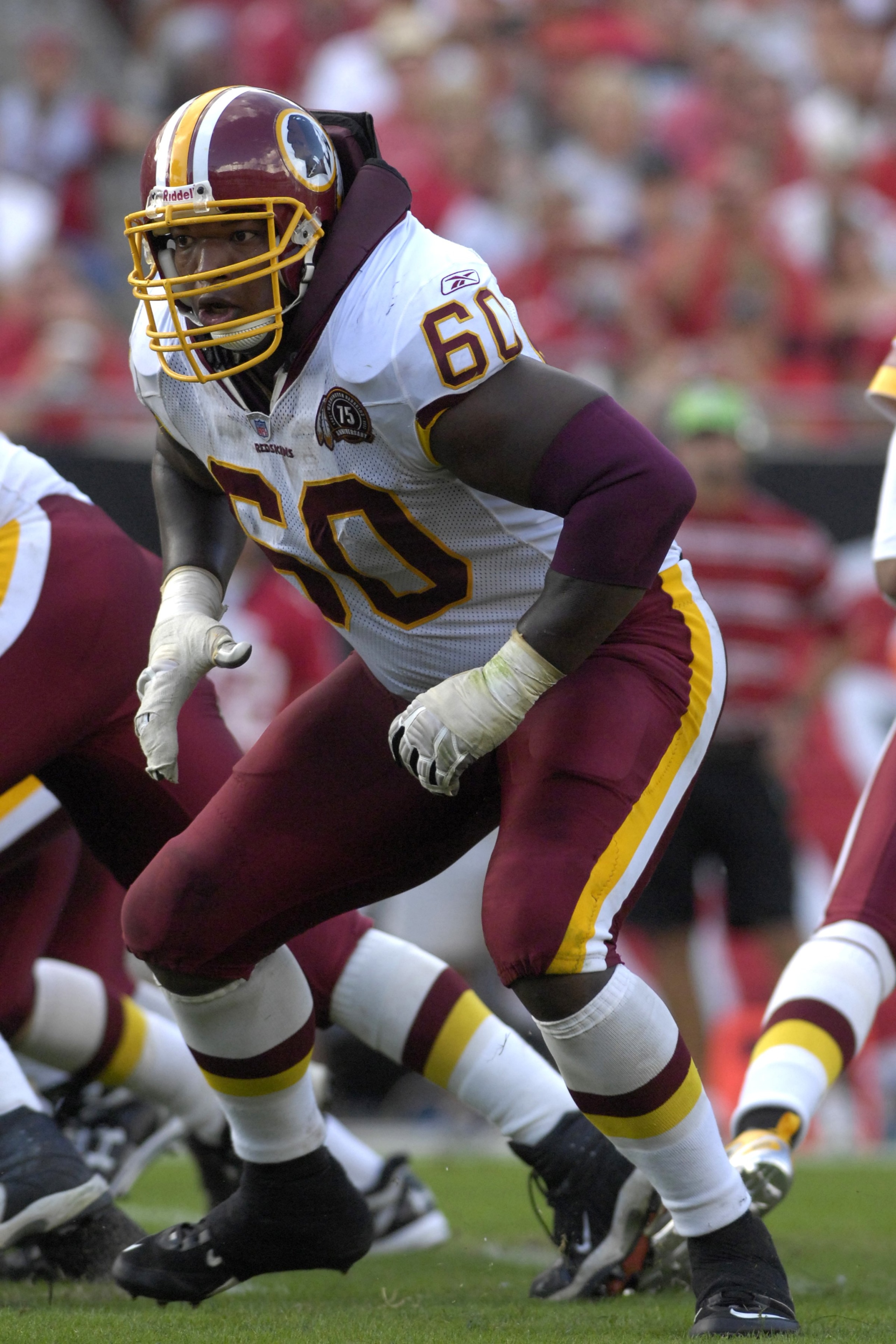 TAMPA, FL - NOVEMBER 25: Tackle Chris Samuels #60 of the Washington Redskins sets to block against the Tampa Bay Buccaneers at the Raymond James Stadium on November 25, 2007 in Tampa, Florida.  The Bucs won 19-13. (Photo by Al Messerschmidt/Getty Images)