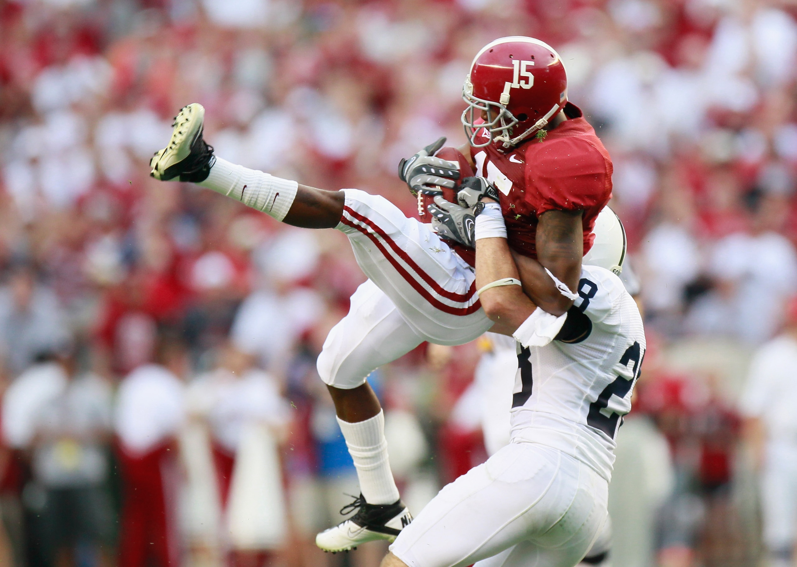 TUSCALOOSA, AL - SEPTEMBER 11:  Darius Hanks #15 of the Alabama Crimson Tide pulls in a reception against David Soldner #28 of the Penn State Nittany Lions at Bryant-Denny Stadium on September 11, 2010 in Tuscaloosa, Alabama.  (Photo by Kevin C. Cox/Getty