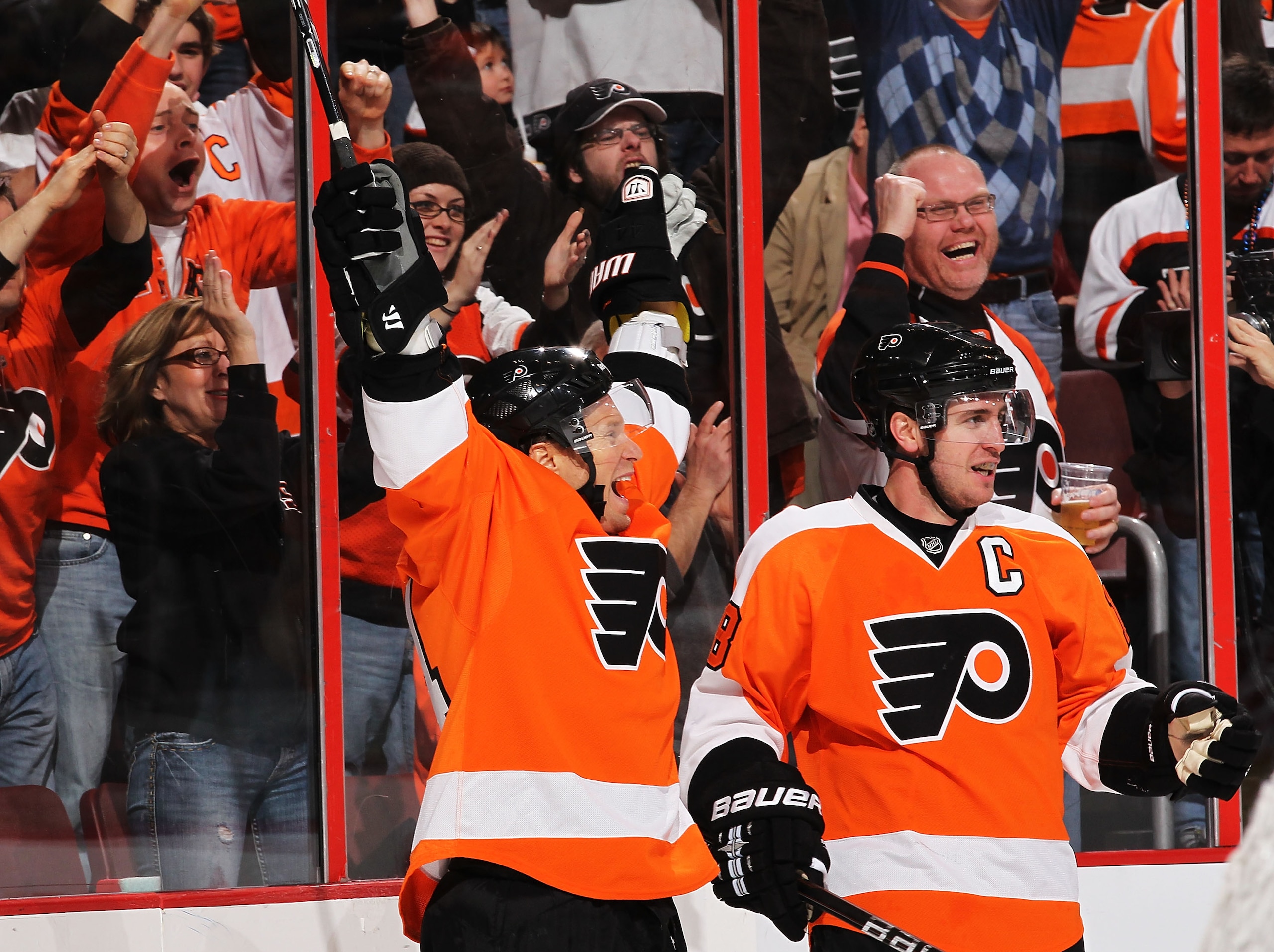 PHILADELPHIA - MARCH 05:  Kimmo Timonen #44  of The Philadelphia Flyers celebrates his short handed goal with Mike Richards #18 against The Buffalo sabres during their game on March 5, 2011 at The Wells Fargo Center in Philadelphia, Pennsylvania.  (Photo