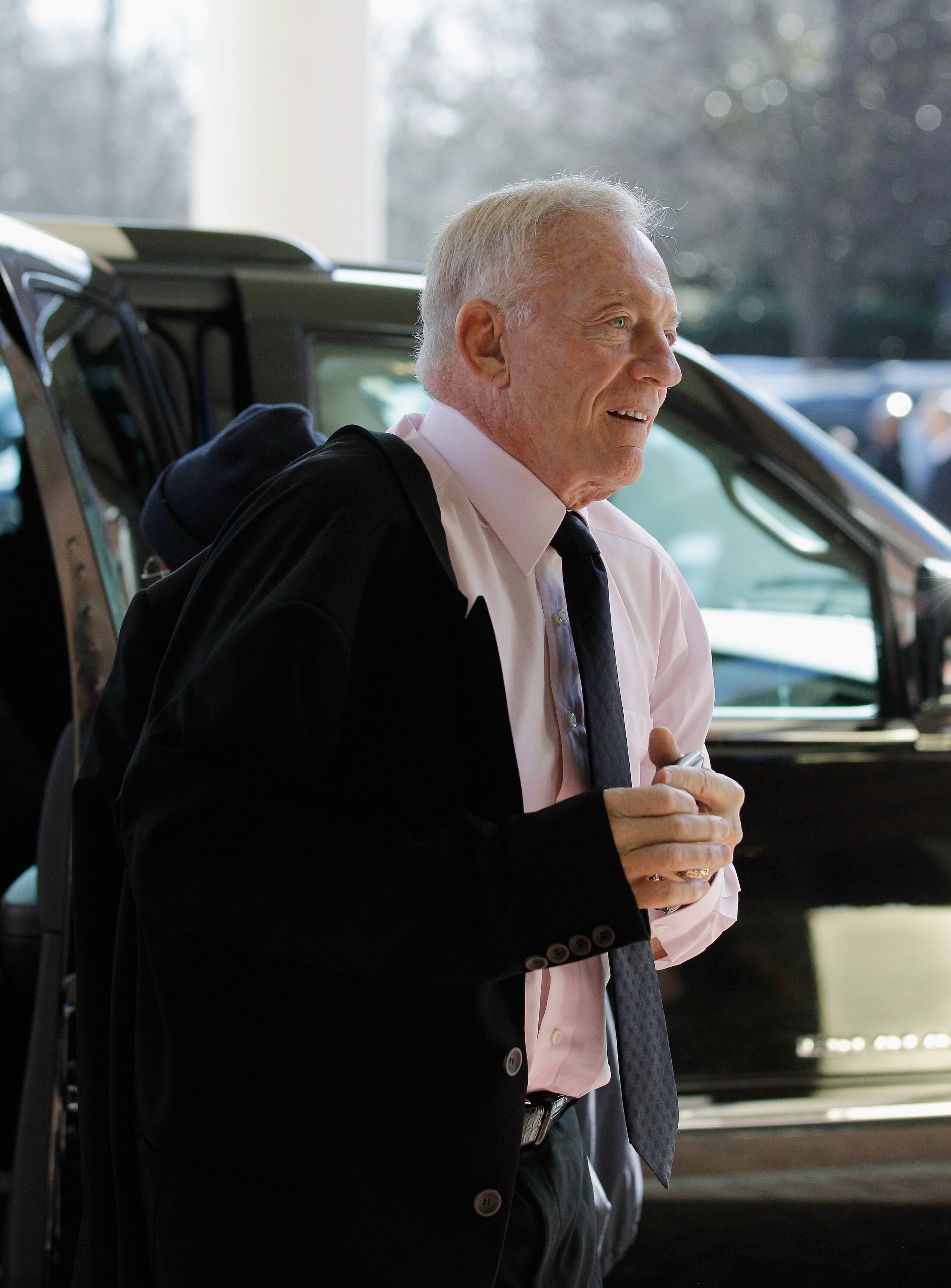 CHANTILLY, VA - MARCH 02:  Jerry Jones, owner of the NFL football team Dallas Cowboys, exits a car before attending a meeting of NFL owners at a hotel on March 2, 2011 in Chantilly, Virginia. The NFL owners are meeting in Chantilly to discuss negotiations