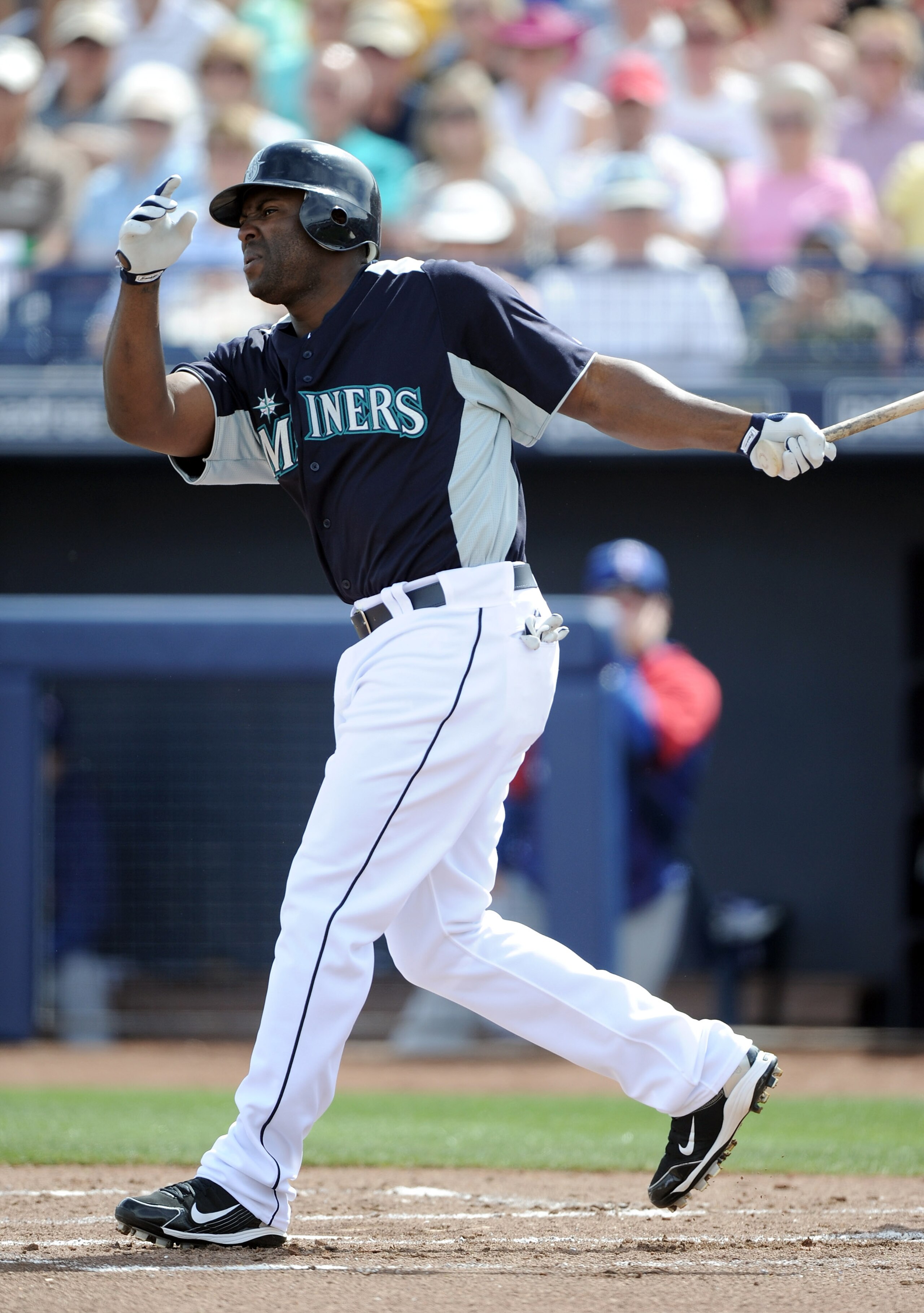 PEORIA, AZ - MARCH 01:  Milton Bradley #15 of the  Seattle Mariners at bat against the Texas Rangers during spring training at Peoria Stadium on March 1, 2011 in Peoria, Arizona.  (Photo by Harry How/Getty Images)