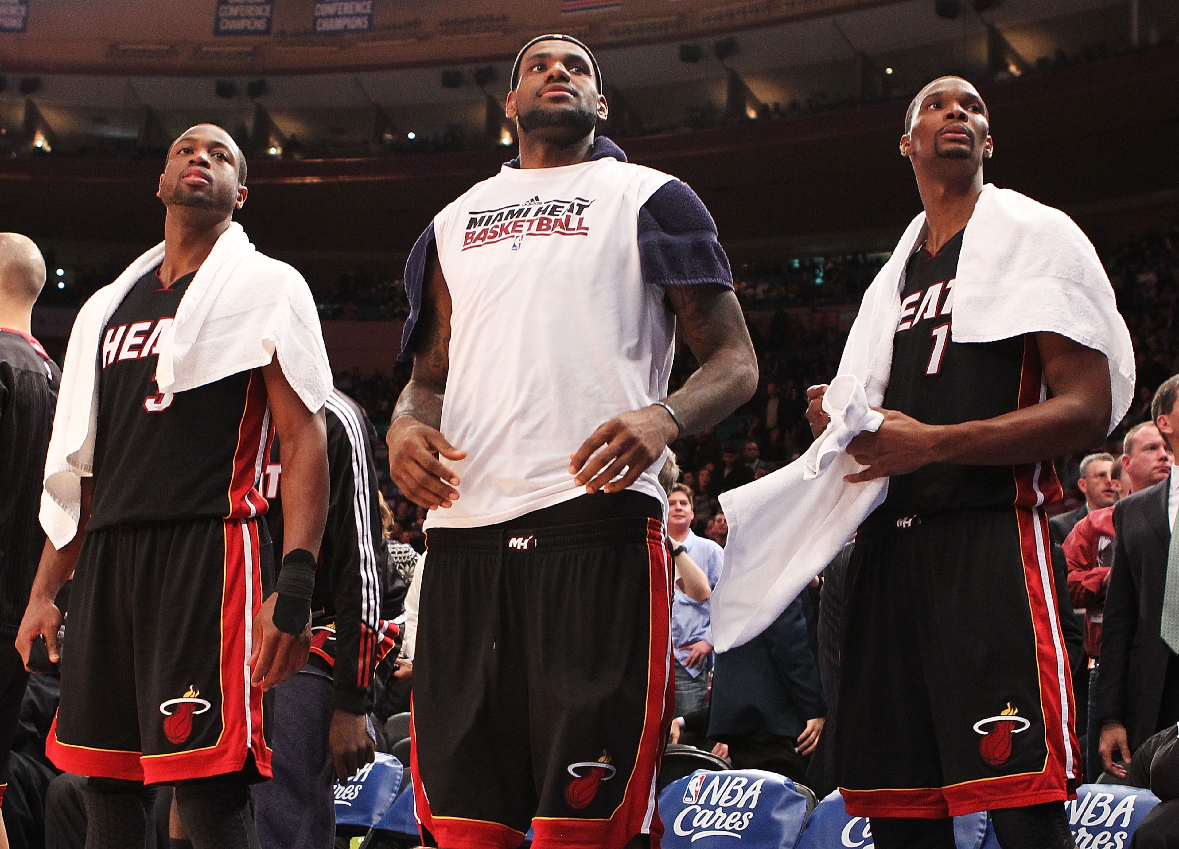 NEW YORK, NY - DECEMBER 17:  Dwyane Wade #3, LeBron James #6, and Chris Bosh #1 of the Miami Heat look on during their 113-91 win against the New York Knicks at Madison Square Garden on December 17, 2010 in New York City. NOTE TO USER: User expressly ackn