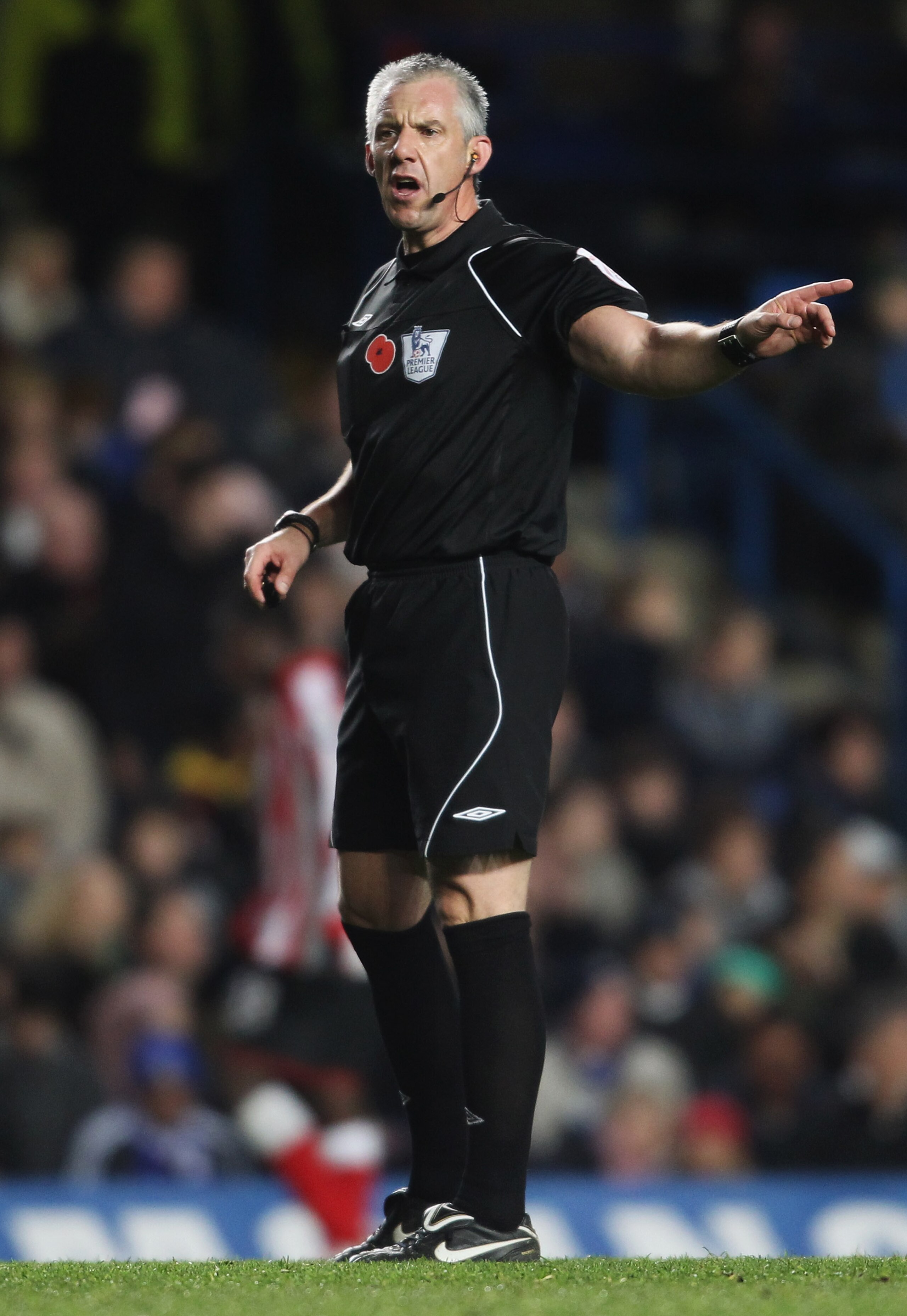 LONDON, ENGLAND - NOVEMBER 14:  Referee Chris Foy signals during the Barclays Premier League match between Chelsea and Sunderland at Stamford Bridge on November 14, 2010 in London, England.  (Photo by Scott Heavey/Getty Images)