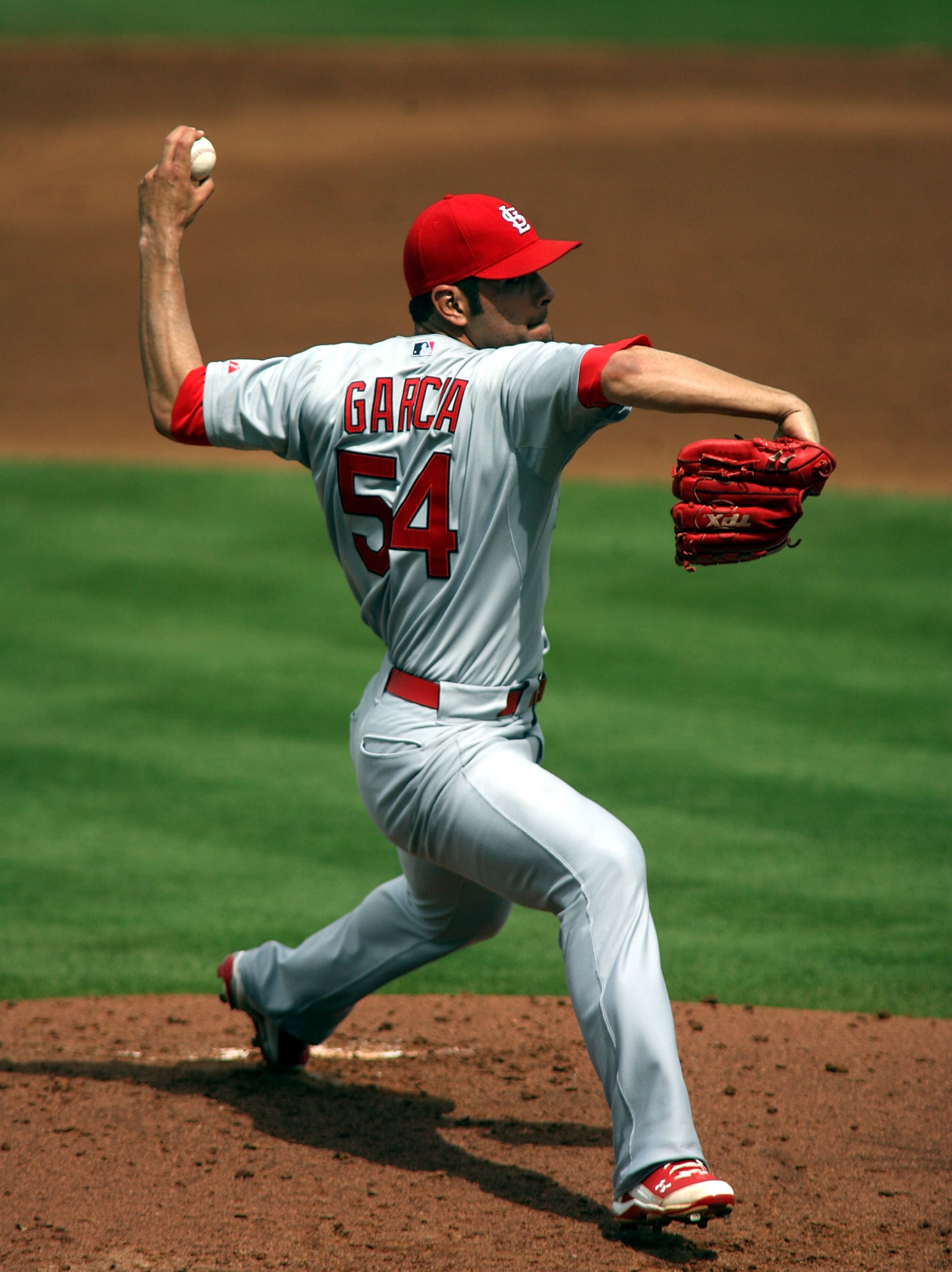 PORT ST. LUCIE, FL - MARCH 03:  Pitcher Jaime Garcia #54 of the St. Louis Cardinals throws against the New York Mets at Digital Domain Park on March 3, 2011 in Port St. Lucie, Florida.  (Photo by Marc Serota/Getty Images)
