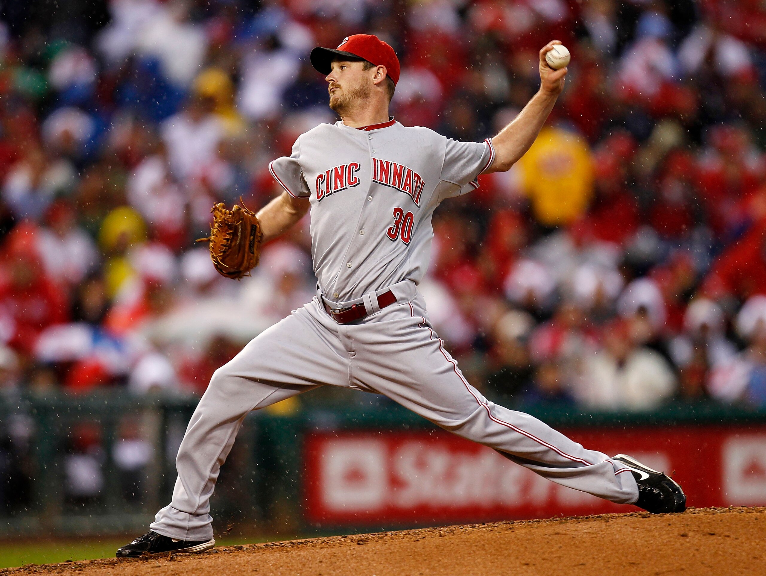PHILADELPHIA - OCTOBER 06:  Travis Wood #30 of the Cincinnati Reds delivers in Game 1 of the NLDS against the Philadelphia Phillies at Citizens Bank Park on October 6, 2010 in Philadelphia, Pennsylvania.  (Photo by Jeff Zelevansky/Getty Images)