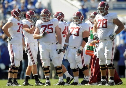 #73, leader of the Offensive Line, though he literally looks up to his fellow linemen