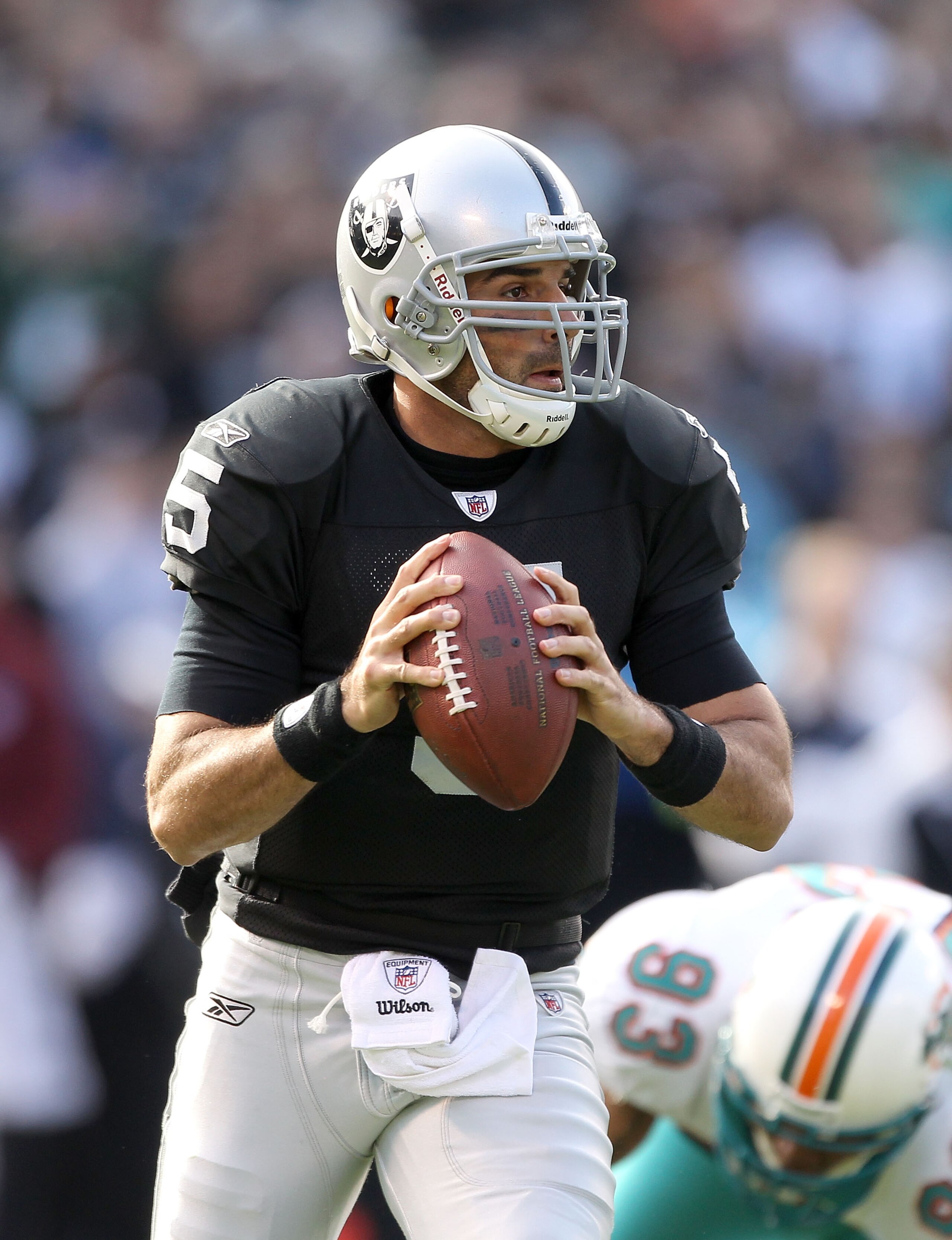 OAKLAND, CA - NOVEMBER 28: Bruce Gradkowski #5 of the Oakland Raiders in action against the Miami Dolphins at Oakland-Alameda County Coliseum on November 28, 2010 in Oakland, California. (Photo by Ezra Shaw/Getty Images) OAKLAND, CA - NOVEMBER 28: Bruce Gradkowski #5 of the Oakland Raiders in action against the Miami Dolphins at Oakland-Alameda County Coliseum on November 28, 2010 in Oakland, California. (Photo by Ezra Shaw/Getty Images)
