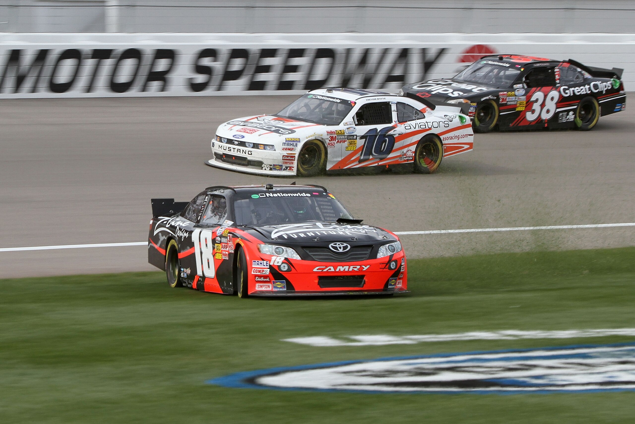 LAS VEGAS, NV - MARCH 05:  Kyle Busch slides his #18 Z-Line Designs Toyota through the grass during the NASCAR Nationwide Series Sam's Town 300 at Las Vegas Motor Speedway on March 5, 2011 in Las Vegas, Nevada.  (Photo by Jerry Markland/Getty Images for N
