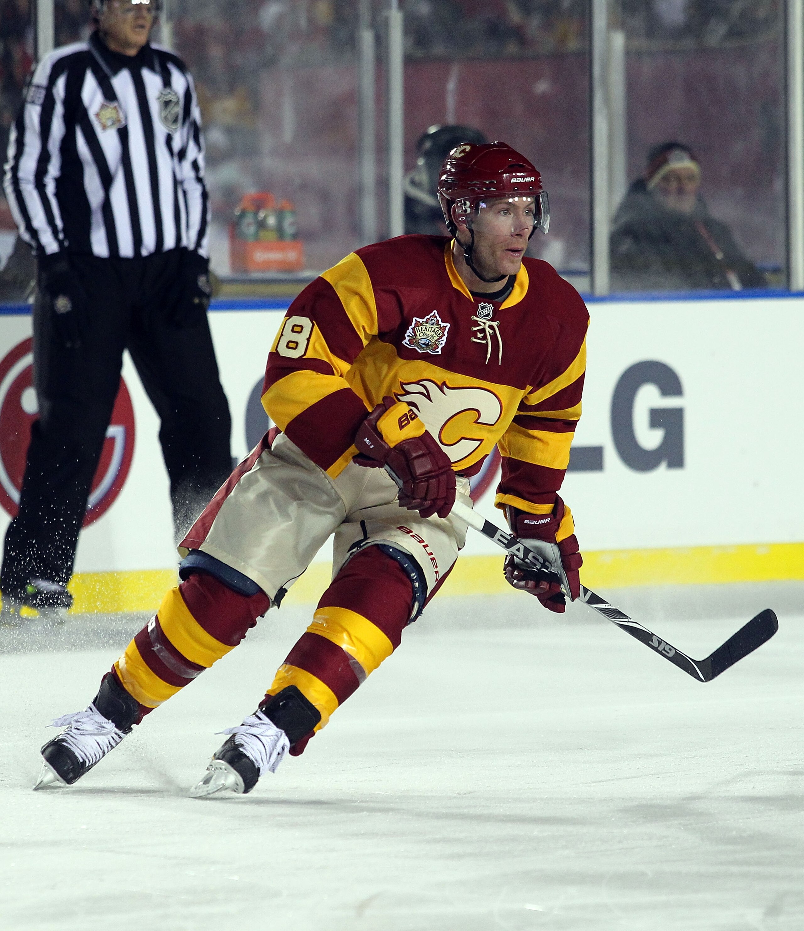 CALGARY, AB - FEBRUARY 20:  Brendan Morrison #8 of the Calgary Flames skates against the Montreal Canadiens during the 2011 NHL Heritage Classic Game at McMahon Stadium on February 20, 2011 in Calgary, Alberta, Canada. The Flames defeated the Canadiens 4-