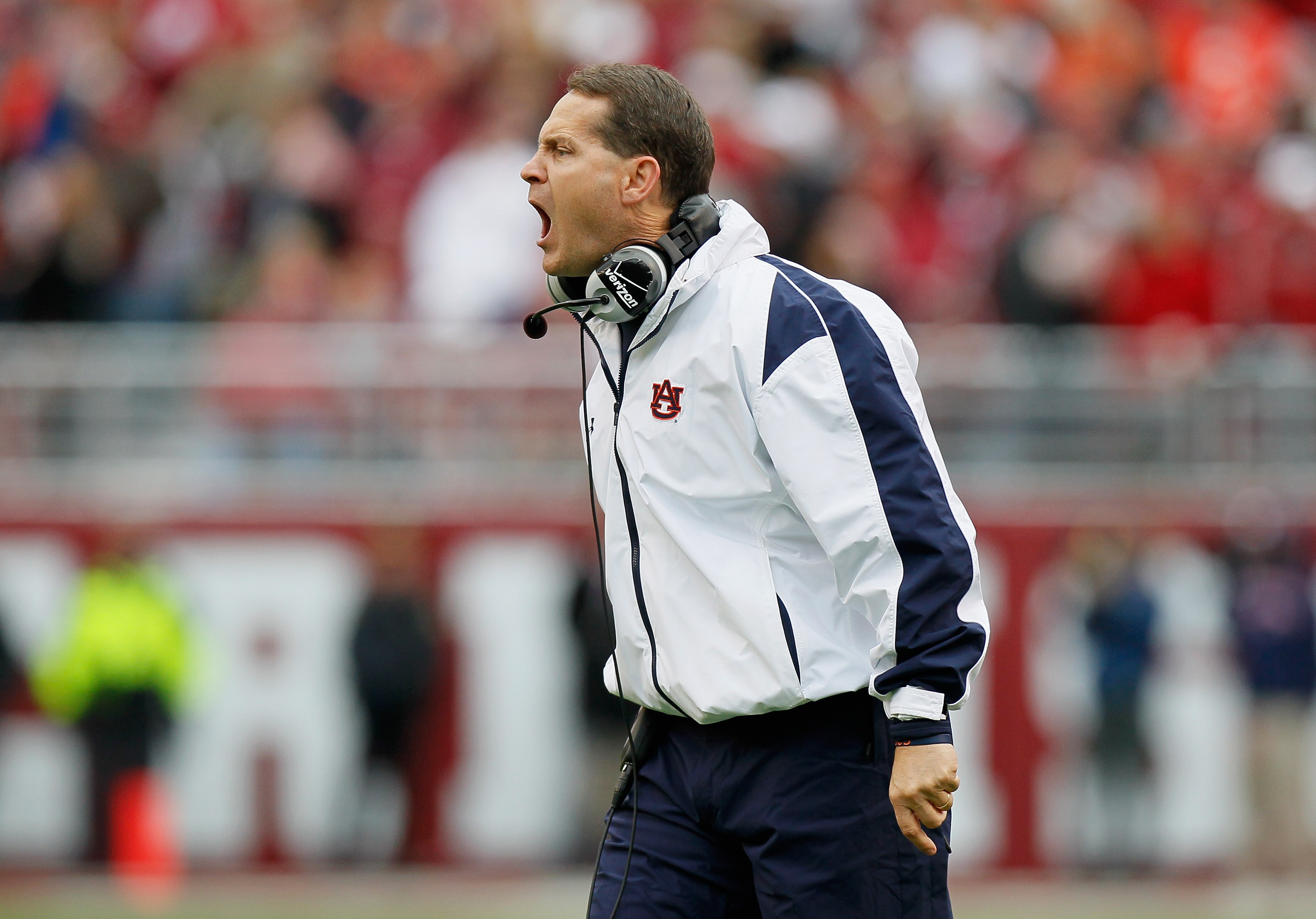 TUSCALOOSA, AL - NOVEMBER 26:  Head coach Gene Chizik of the Auburn Tigers yells to his defense during the game against the Alabama Crimson Tide at Bryant-Denny Stadium on November 26, 2010 in Tuscaloosa, Alabama.  (Photo by Kevin C. Cox/Getty Images)