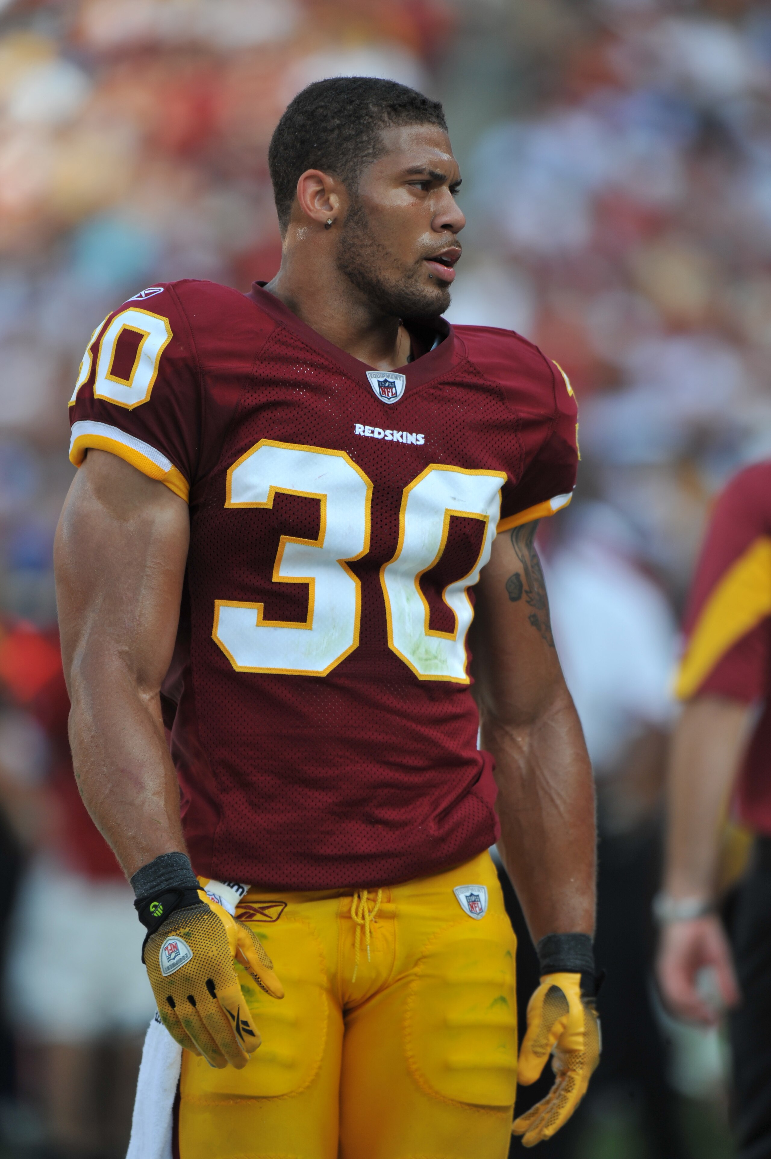 LANDOVER - SEPTEMBER 19:  LaRon Landry #30 of the Washington Redskins walks in the bench area during the game against the Houston Texans at FedExField on September 19, 2010 in Landover, Maryland. The Texans defeated the Redskins in overtime 30-27. (Photo