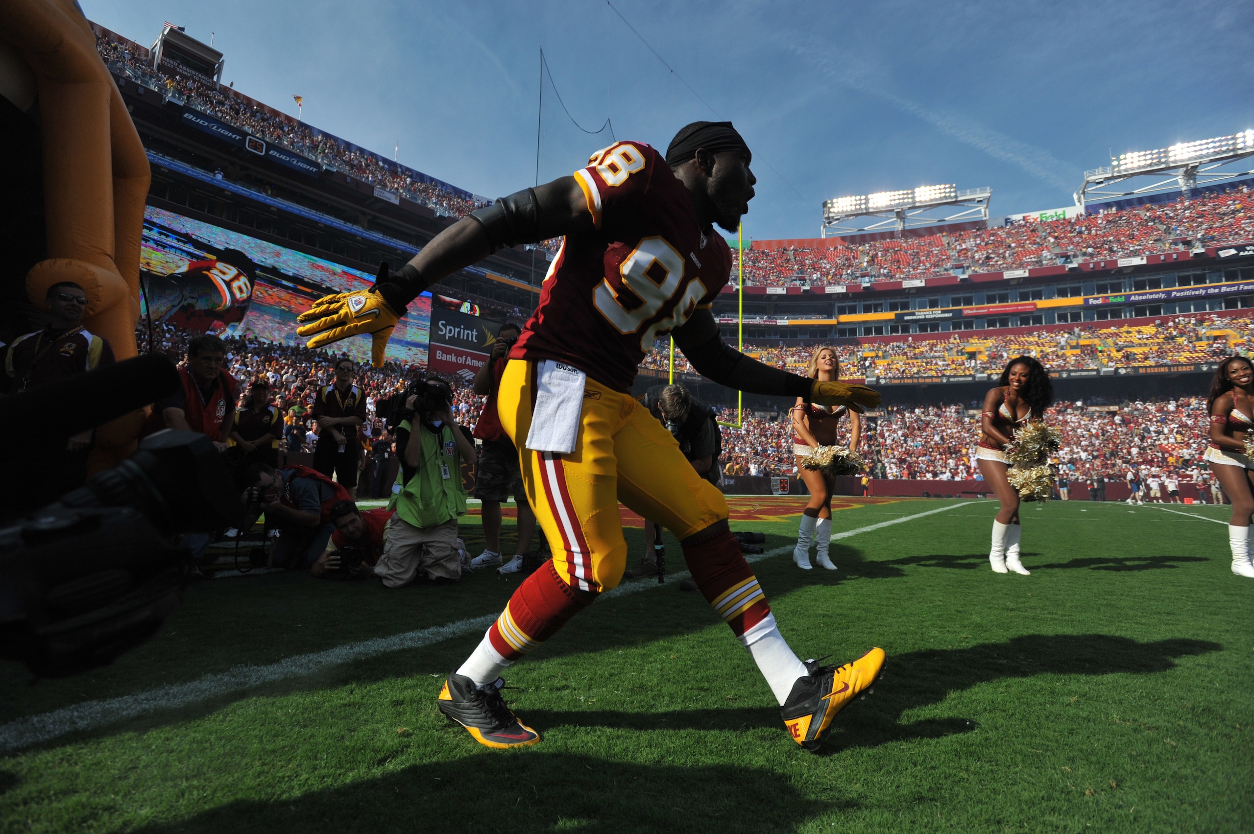 LANDOVER - SEPTEMBER 19:  Brian Orakpo #98 of the Washington Redskins is introduced before the game against the Houston Texans at FedExField on September 19, 2010 in Landover, Maryland. The Texans defeated the Redskins in overtime 30-27. (Photo by Larry F