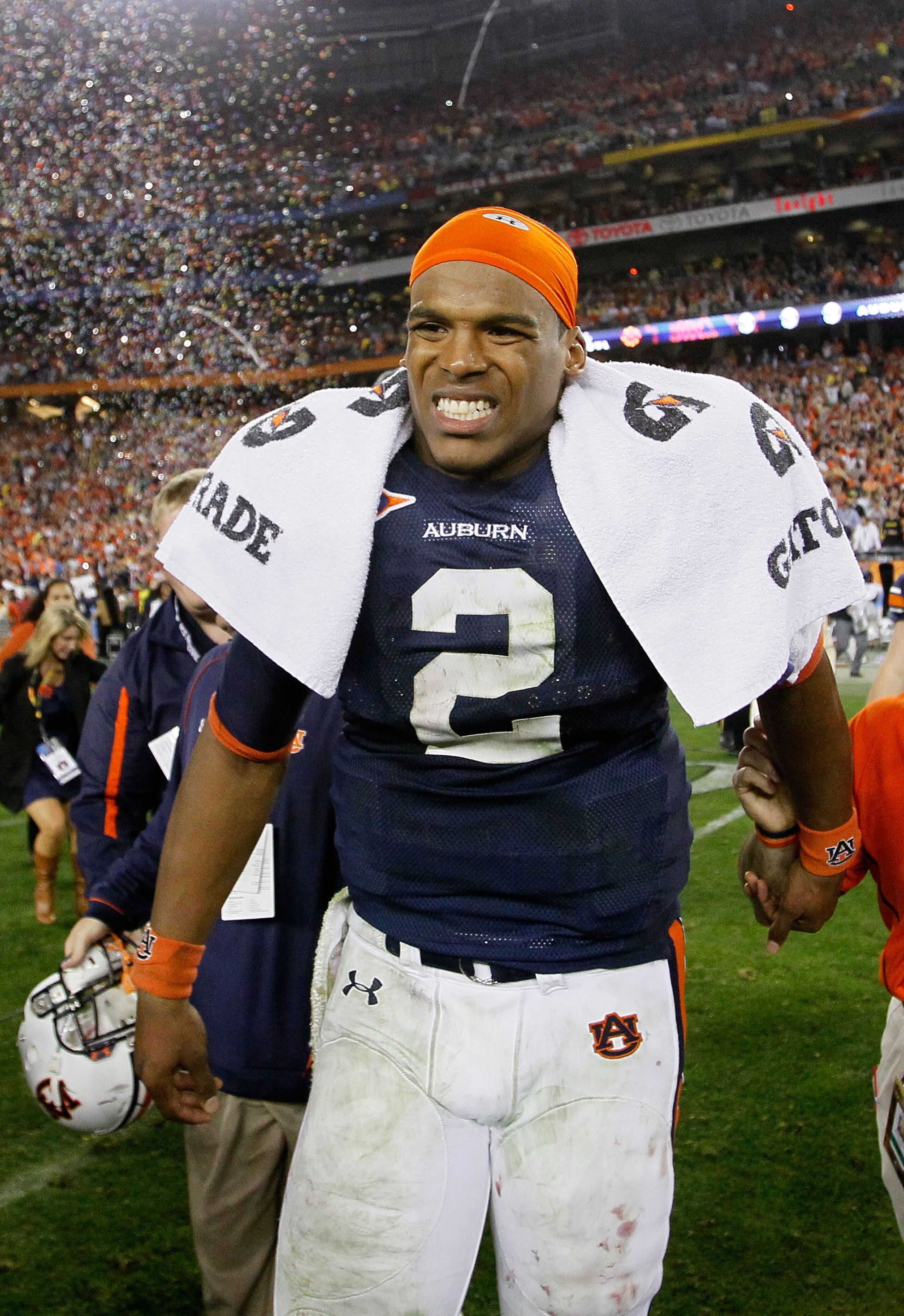 GLENDALE, AZ - JANUARY 10:  Quarterback Cameron Newton #2 of the Auburn Tigers celebrates the Tigers 22-19 victory against the Oregon Ducks in the Tostitos BCS National Championship Game at University of Phoenix Stadium on January 10, 2011 in Glendale, Ar