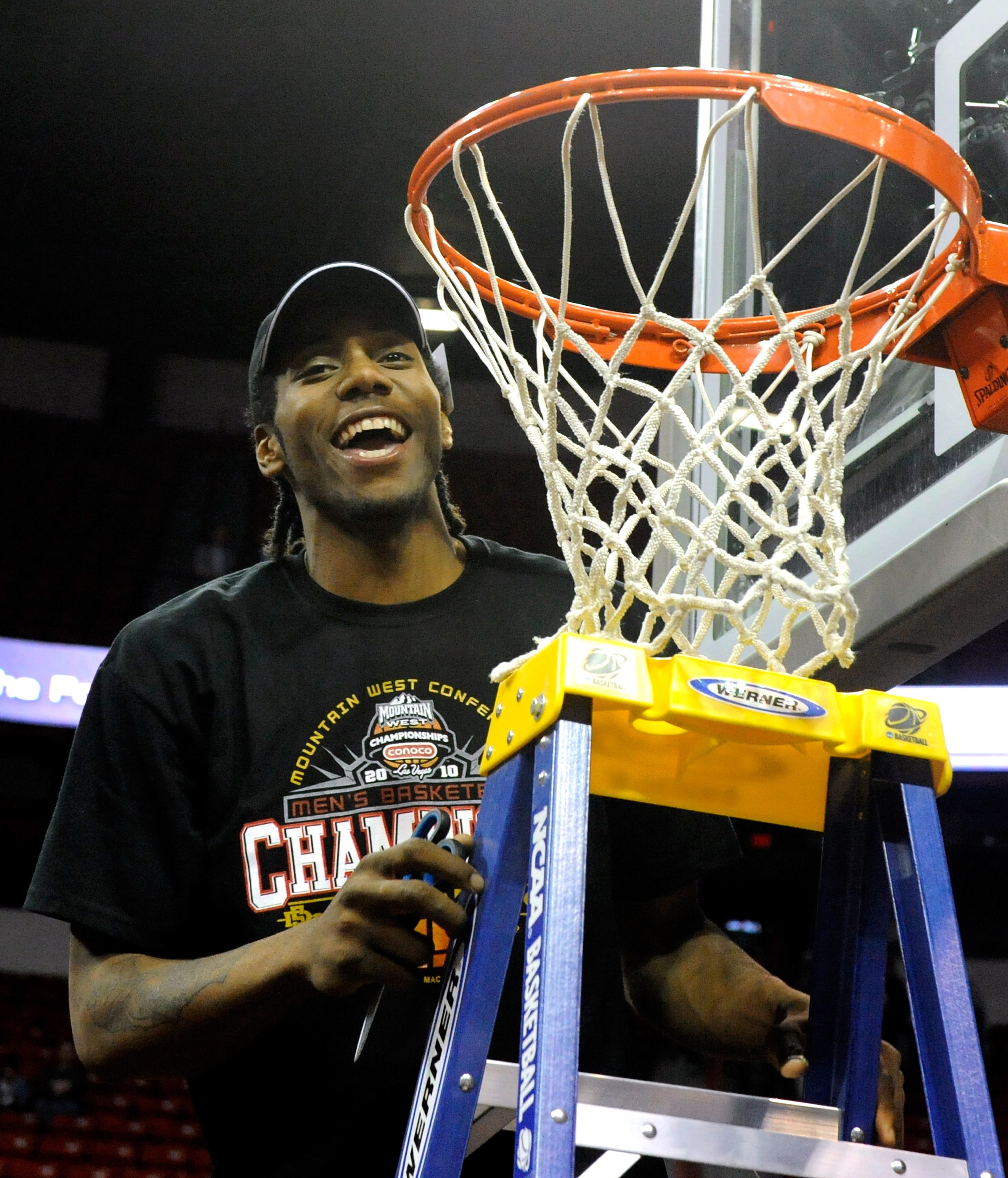 LAS VEGAS - MARCH 13:  Kawhi Leonard #15 of the San Diego State Aztecs smiles as he gets ready to cut down the net after defeating the UNLV Rebels 55-45 in the championship game of the Conoco Mountain West Conference Basketball tournament at the Thomas &
